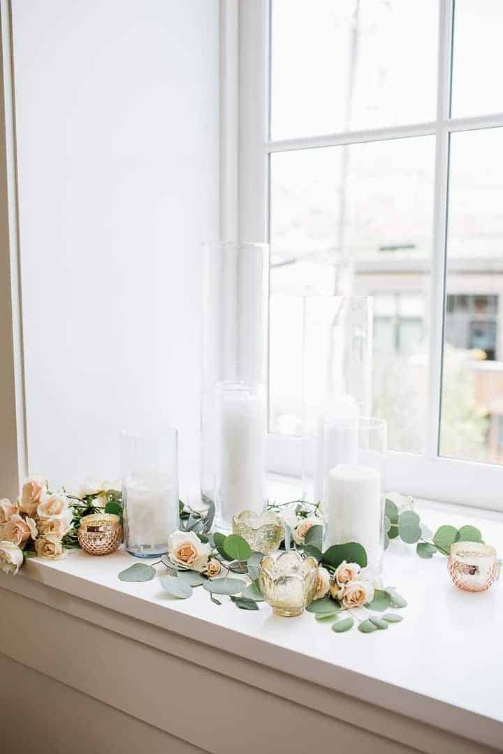 Beautiful-White-Wedding-Candles-Greenery