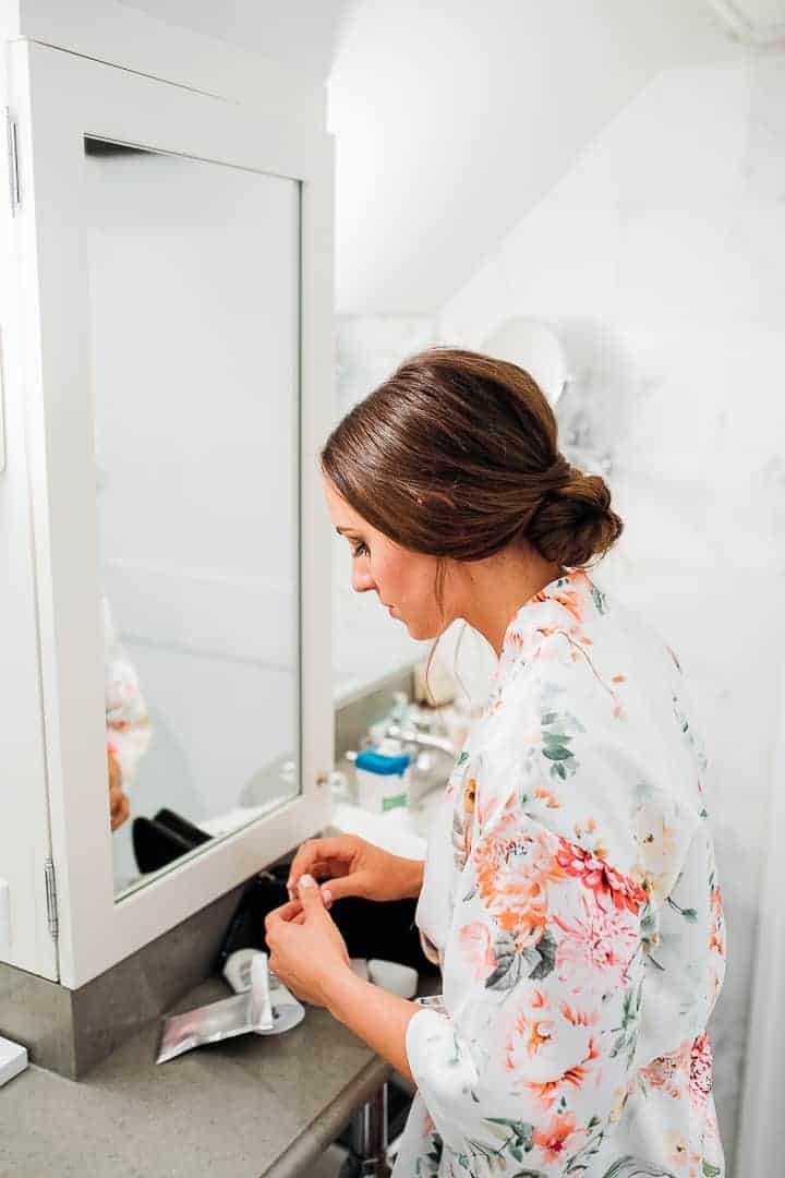 Sleek-Brown-Hair-Wedding-Bun-Floral-Robe