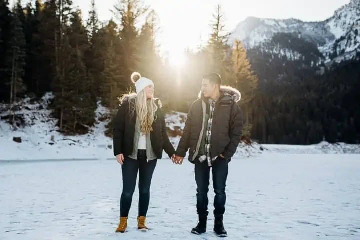 Couple-Holding-Hands-Into-The-Sunset-Utah
