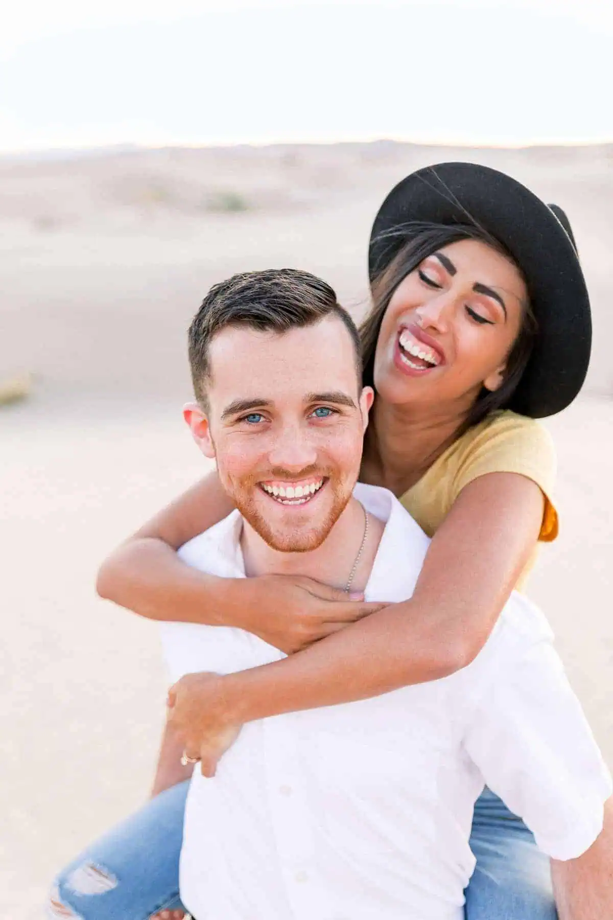 What to wear for engagement pictures, yellow shirt with hat, summer yellow, blue and white outfits