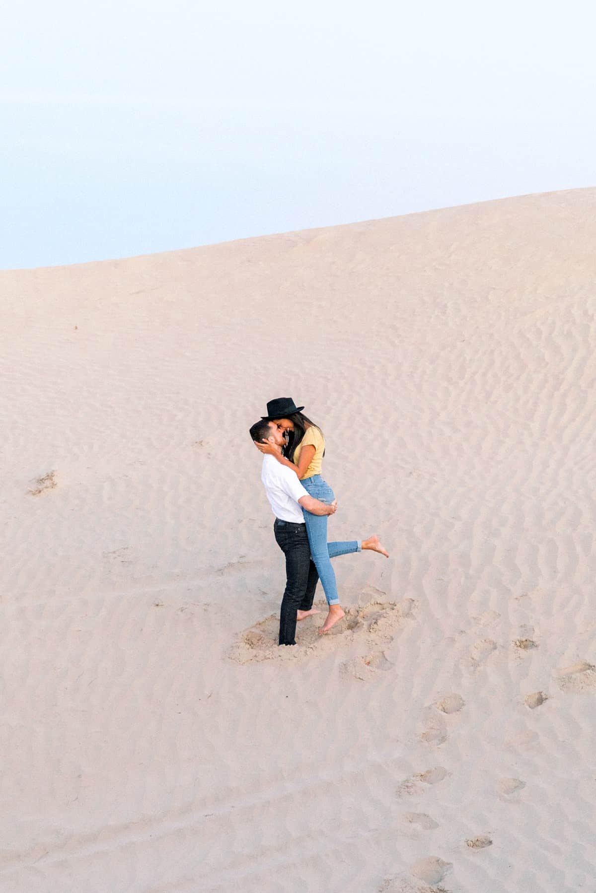 Little Sahara Sand Dunes Fun Engagement Photos at sunset, summer outfit, Utah desert photography