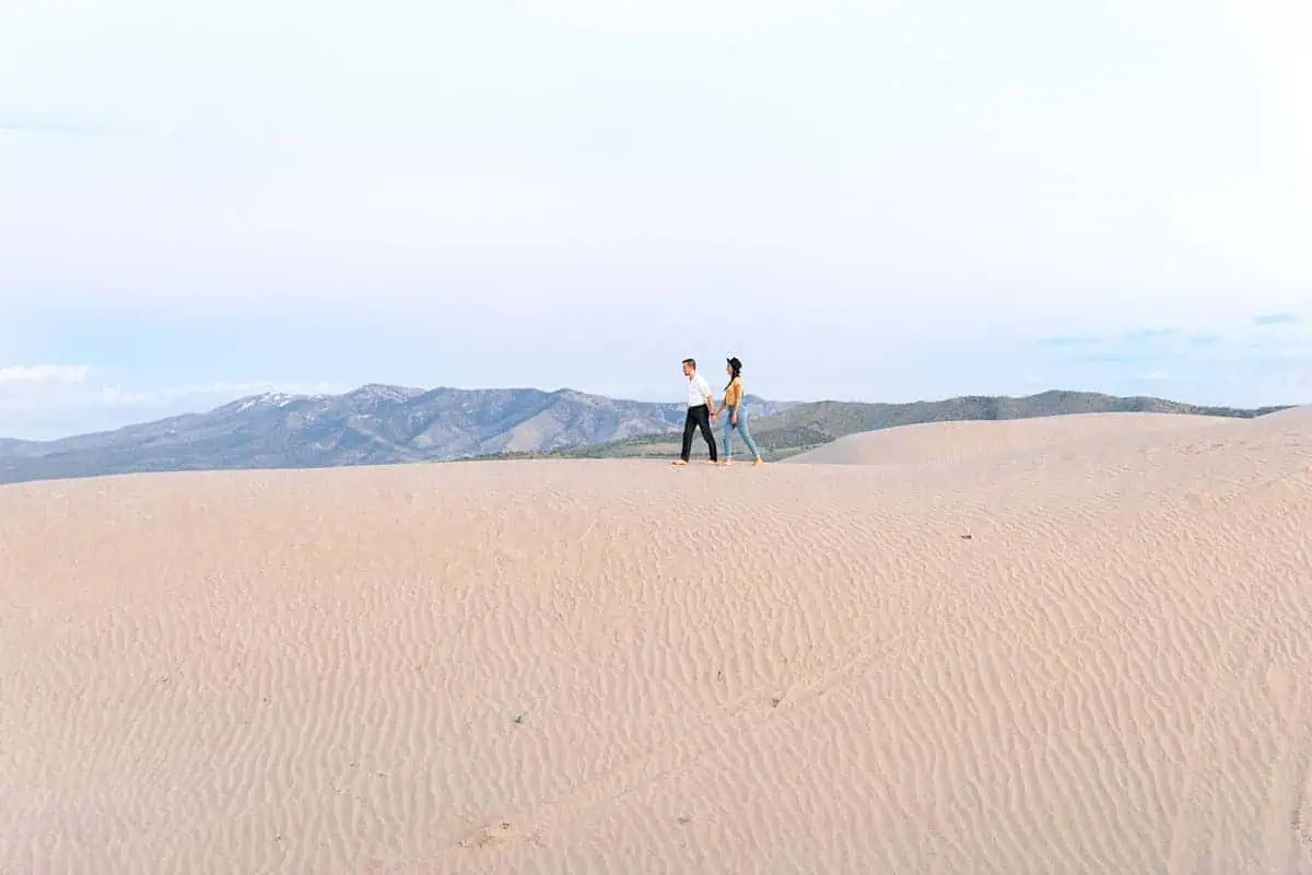 Little Sahara Sand Dunes Fun Engagement Photos at sunset, summer outfit, Utah desert photography