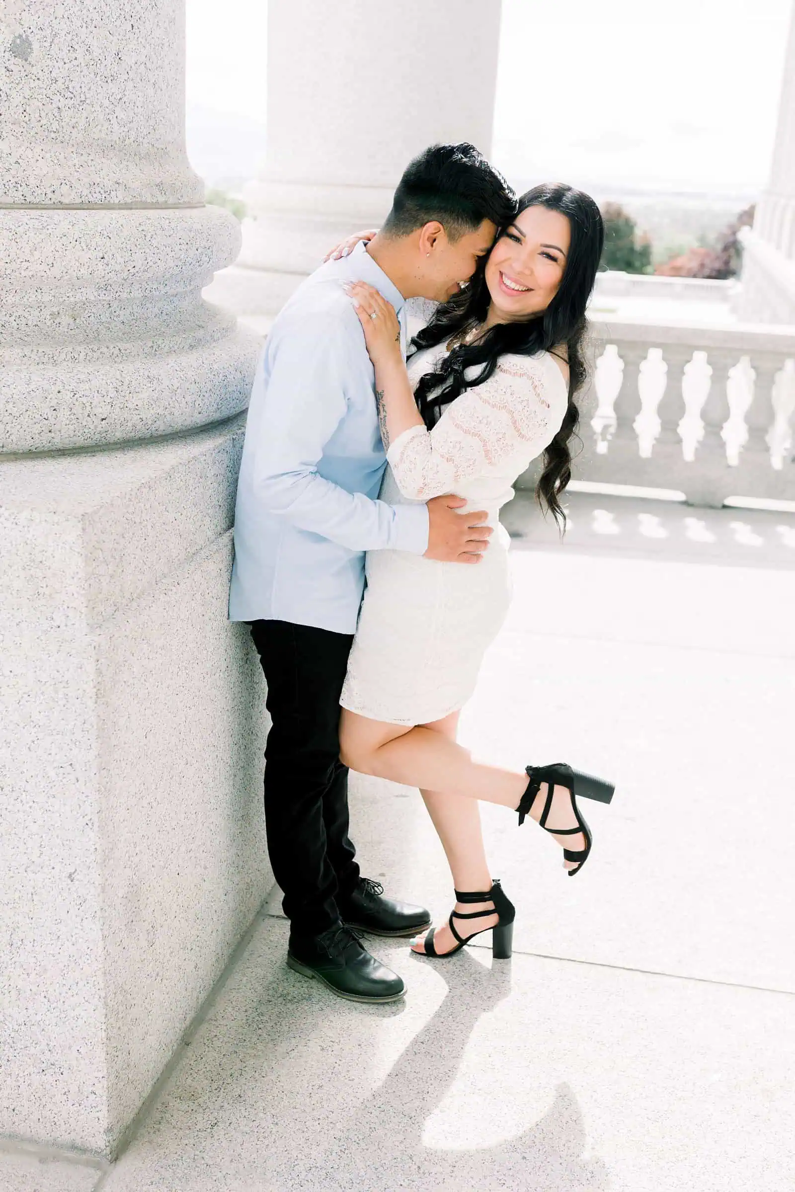 Classy engagement photos at the Utah State Capitol Building in downtown Salt Lake City, outfit for engagement pictures, short white lace dress and light blue button up shirt