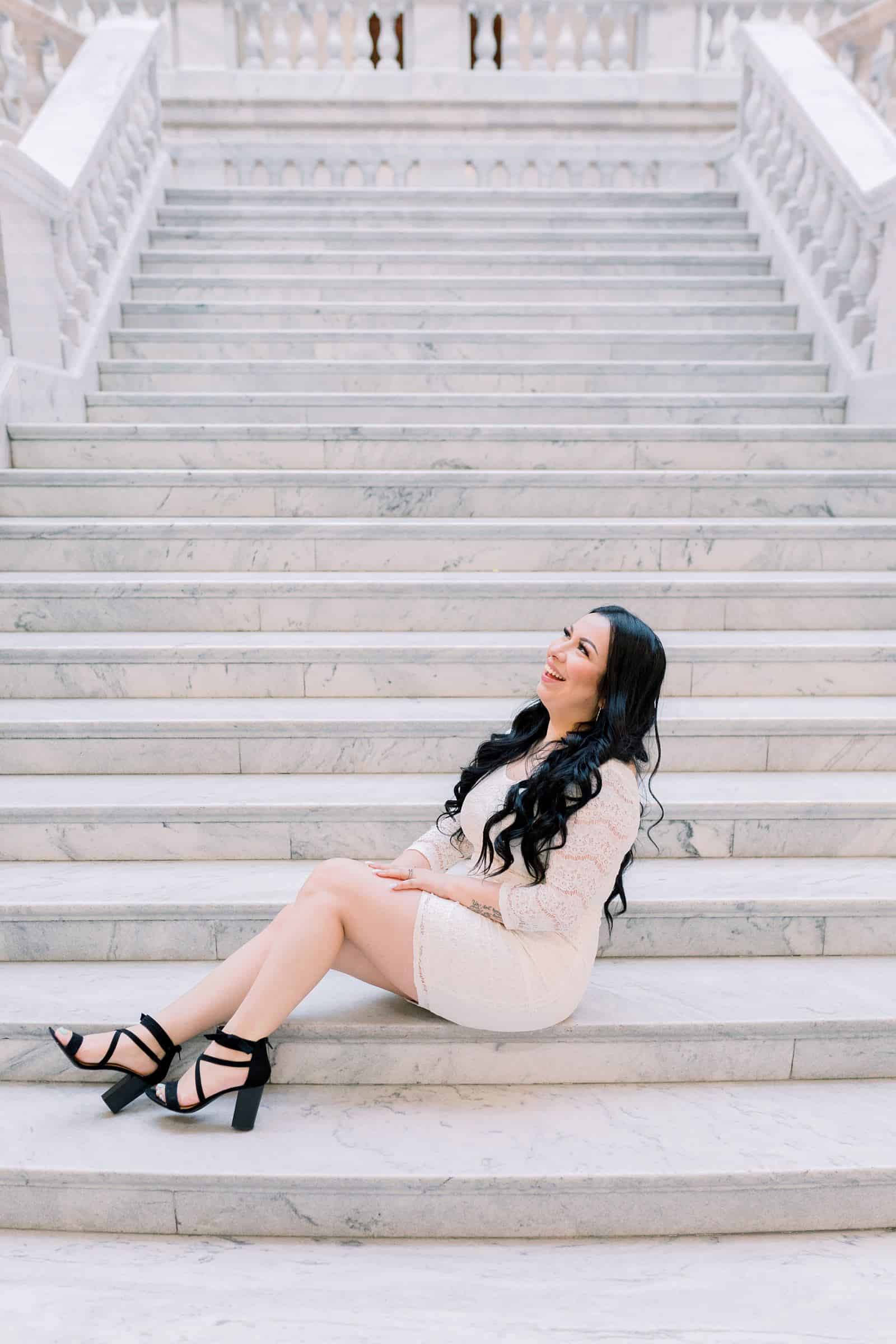 Classy engagement photos at the Utah State Capitol Building in downtown Salt Lake City, outfit for engagement pictures, short white lace dress with long sleeves and black heels