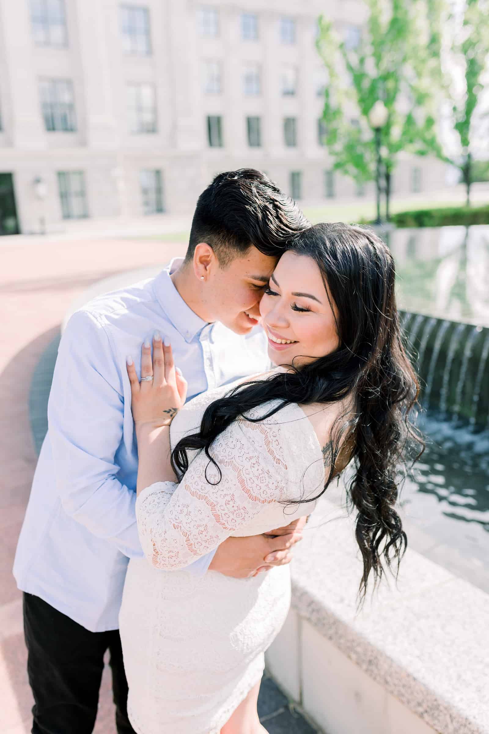 Classy engagement photos at the Utah State Capitol Building in downtown Salt Lake City, spring fountain pictures