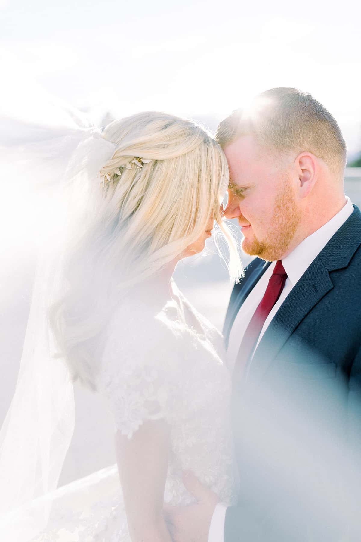 Spring film wedding photography, Utah bride and groom, modest wedding dress with long veil