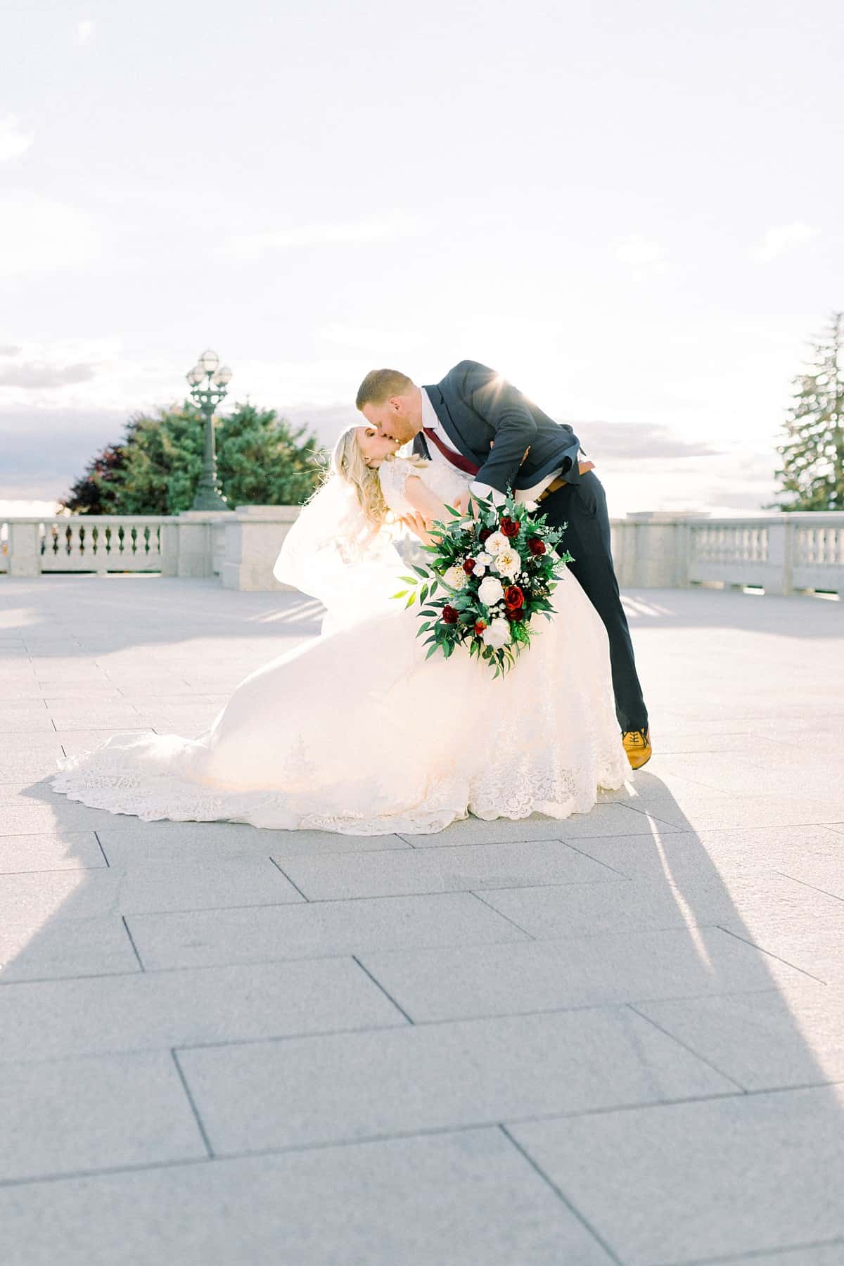 Bride and groom at Utah State Capitol Building, spring film wedding photography