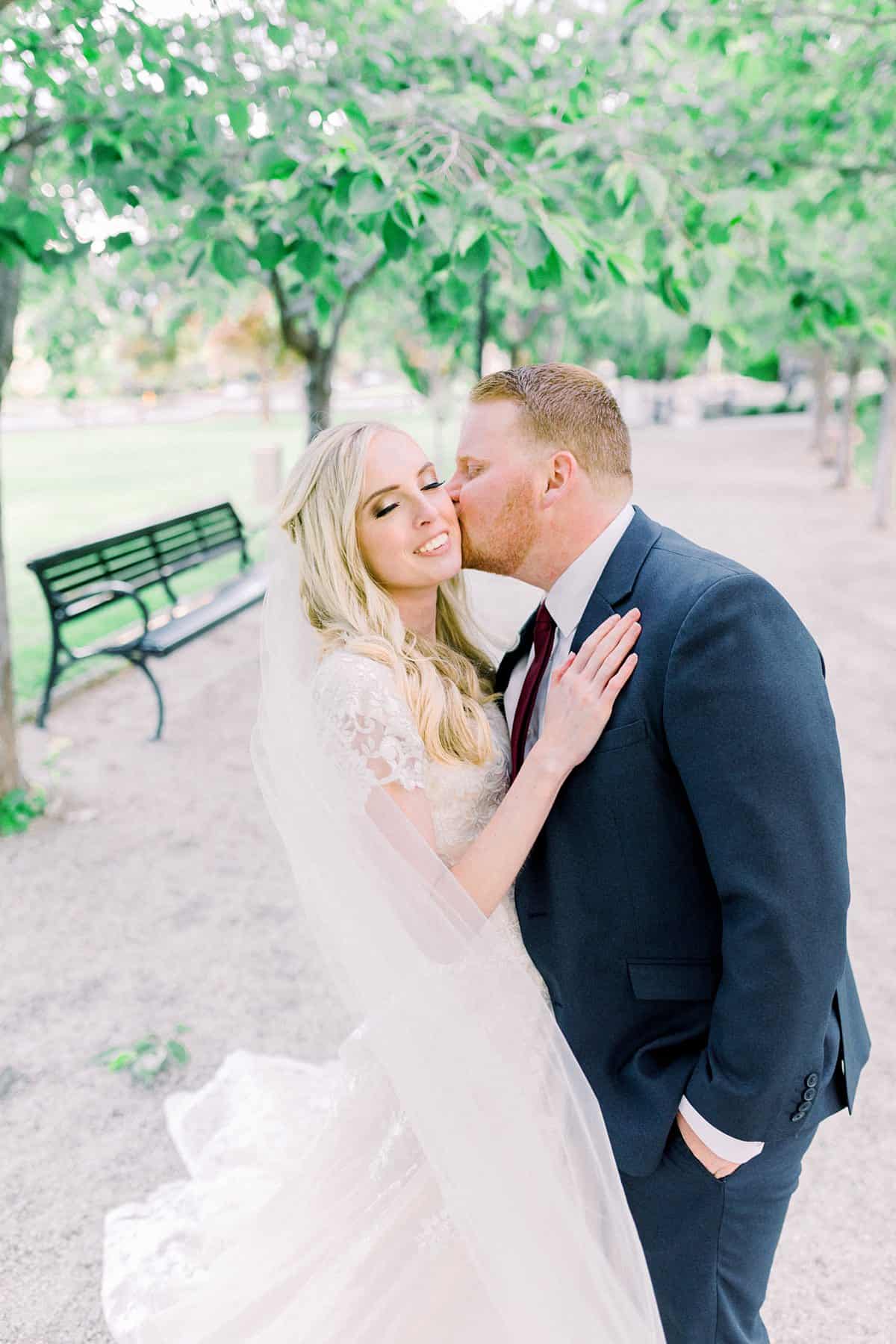 Spring film wedding photography, Utah bride and groom, modest wedding dress with long veil