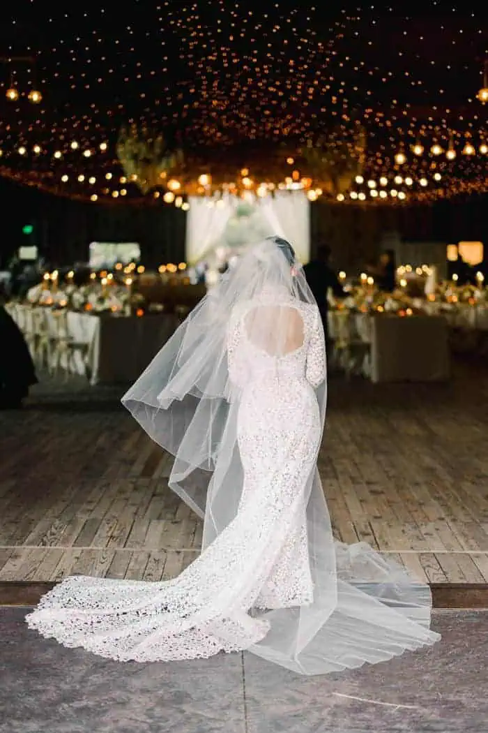 Bride and groom with wedding dress in utah mountains