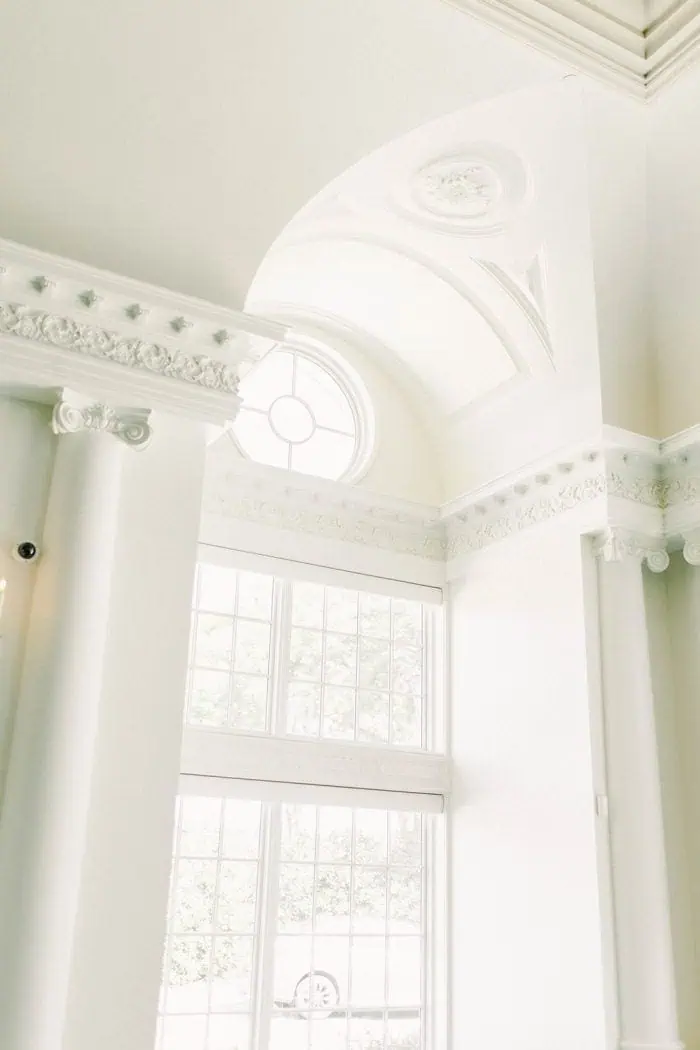 wedding photo portfolio white walls and window