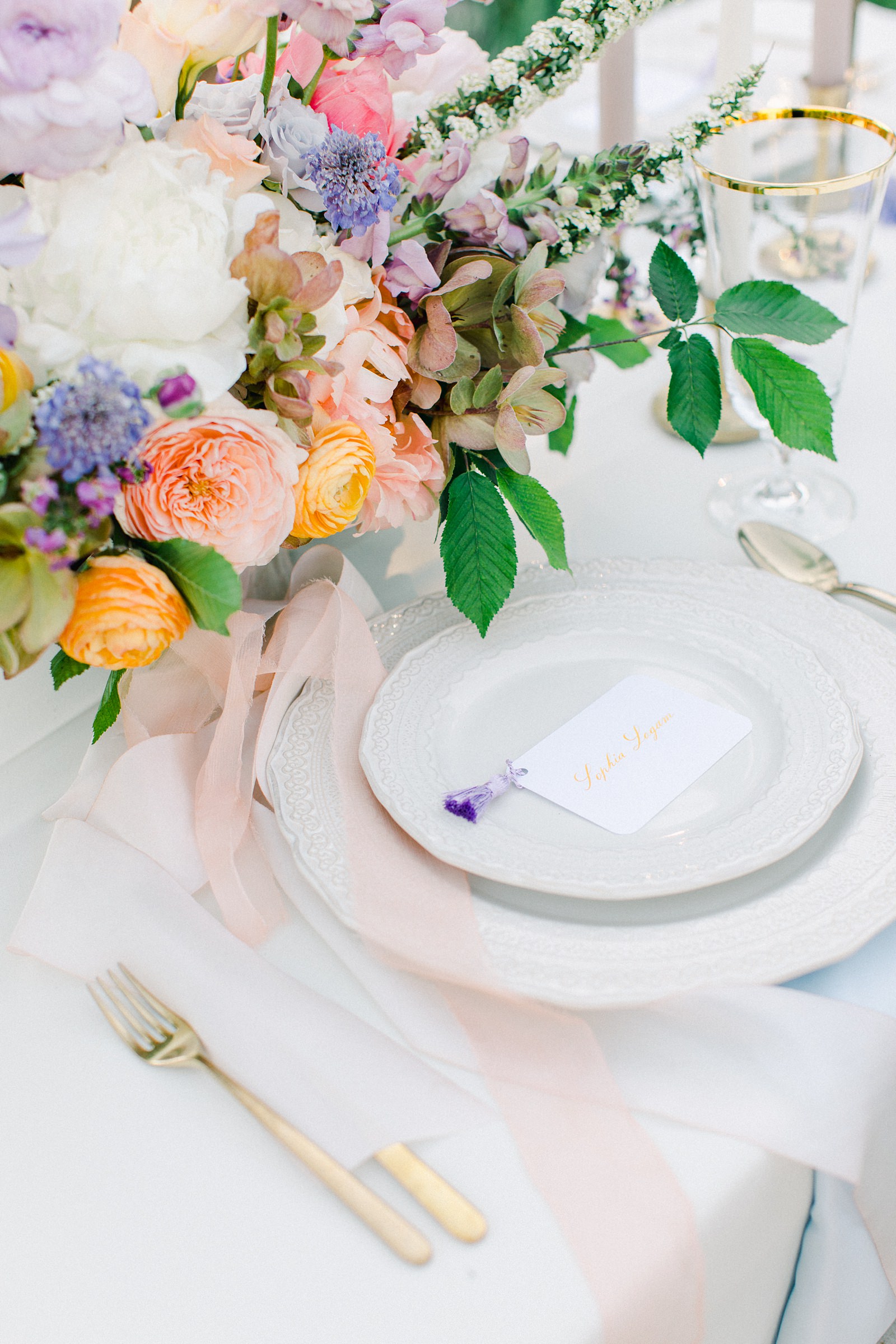 Outdoor Spring Secret Garden Wedding, Provo Utah Film Wedding Photography, colorful floral centerpiece wedding flowers simple white tablescape, place setting calligraphy place card