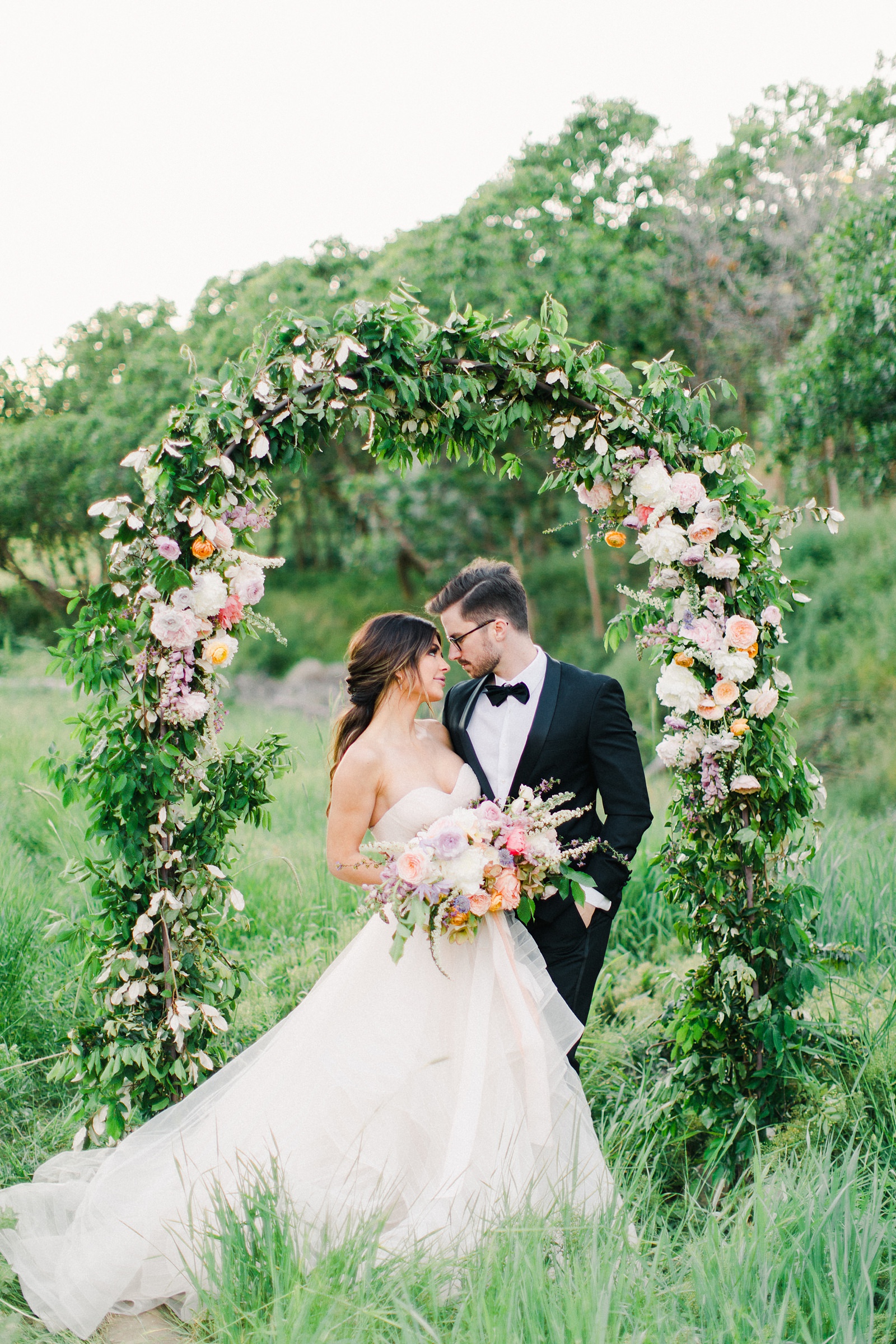 Outdoor Spring Secret Garden Wedding, Provo Utah Film Wedding Photography, bride and groom with floral arch wedding flowers