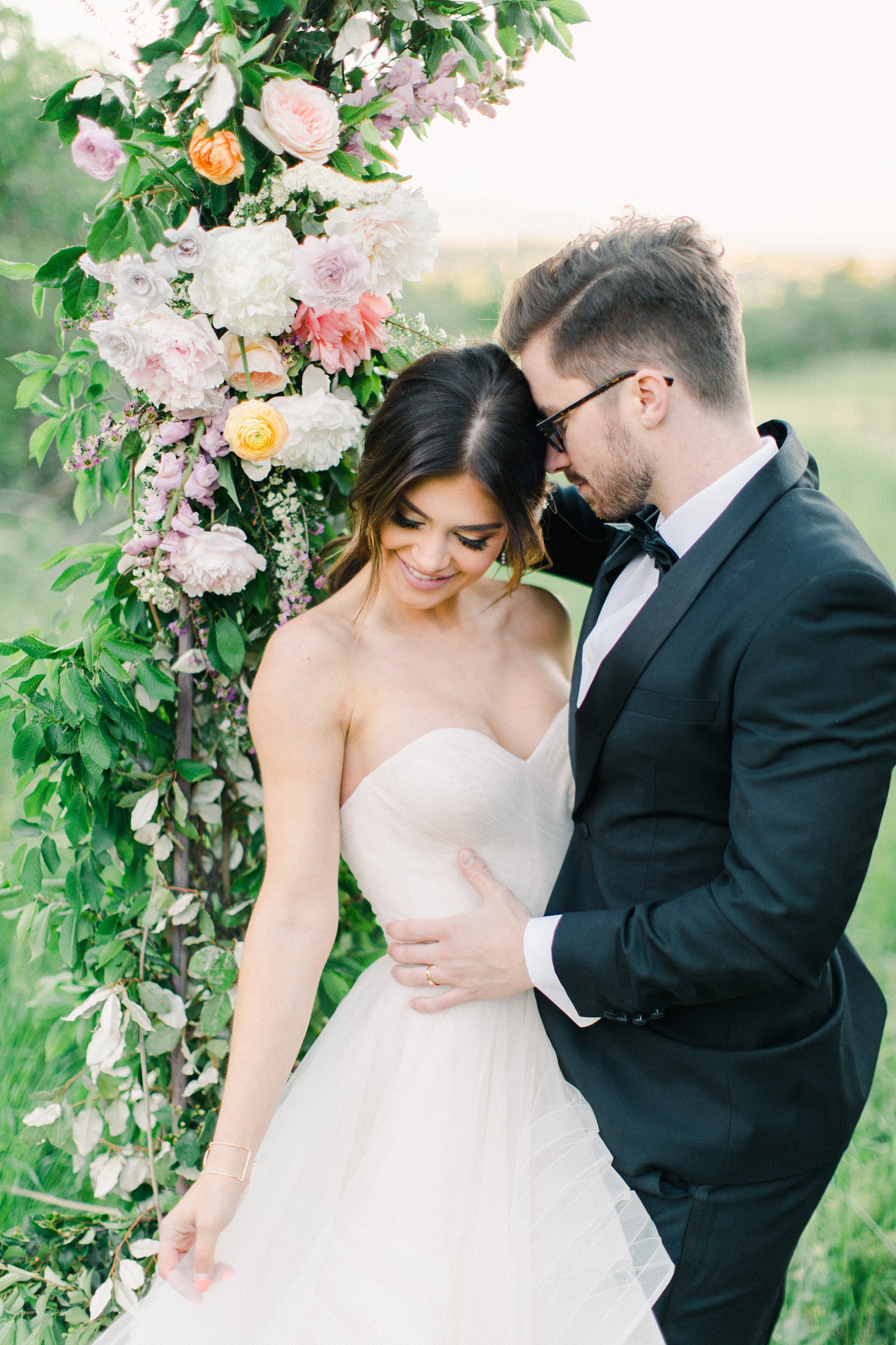 Outdoor Spring Secret Garden Wedding, Provo Utah Film Wedding Photography, bride and groom with floral arch wedding flowers