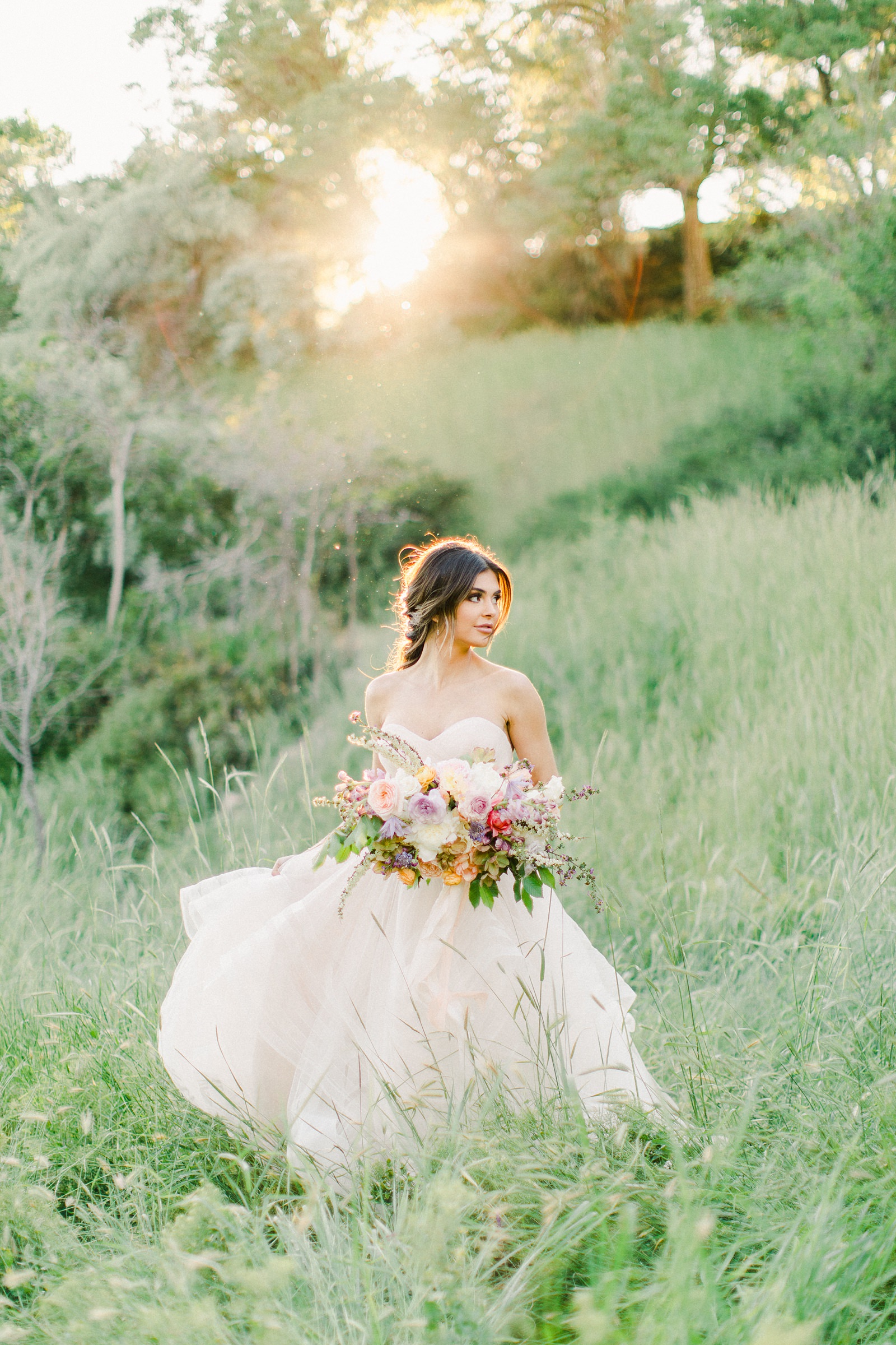 Outdoor Spring Secret Garden Wedding, Provo Utah Film Wedding Photography, pastel wildflower bouquet purple wedding flowers, bride wearing BHLDN wedding dress with sweetheart neckline