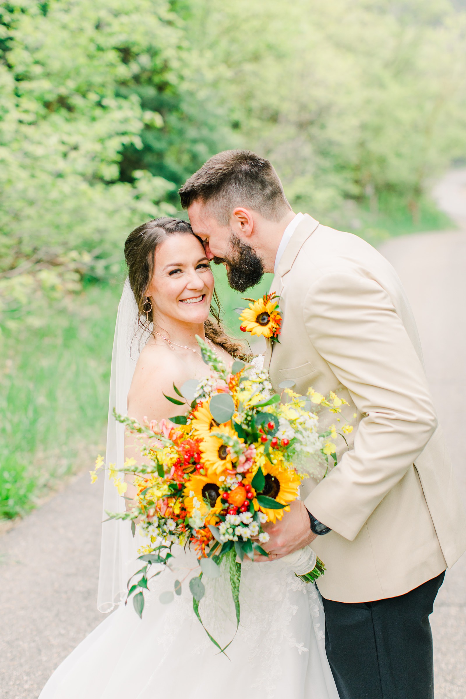 Millcreek Inn Summer Wedding, Utah wedding photography Millcreek Canyon, Salt Lake City, bride and groom sunflower yellow and orange bouquet wedding flowers