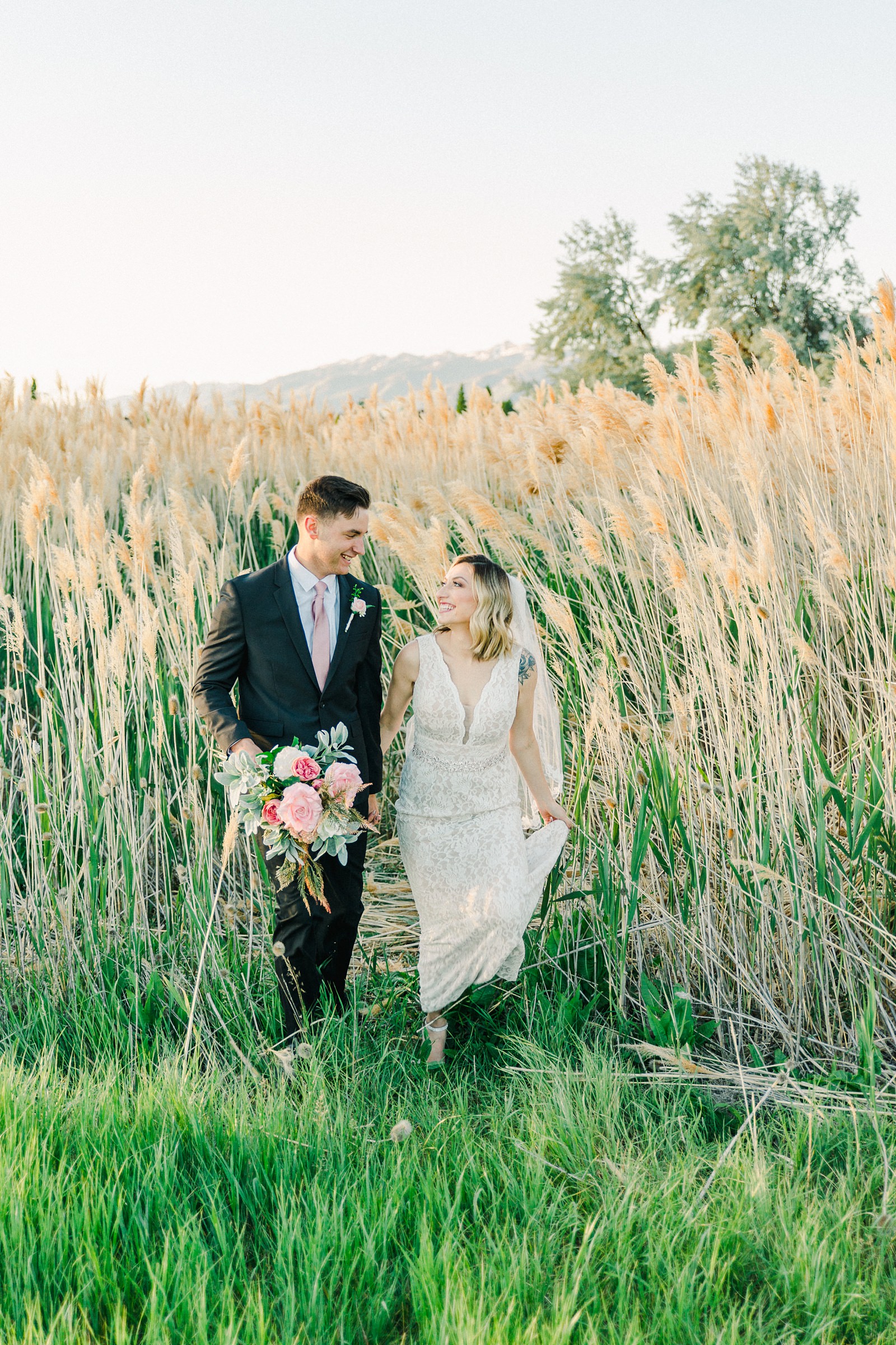 Salt Lake City Utah Bridal Wedding Photography, Tunnel Springs Park, bride and groom in long grasses cattails