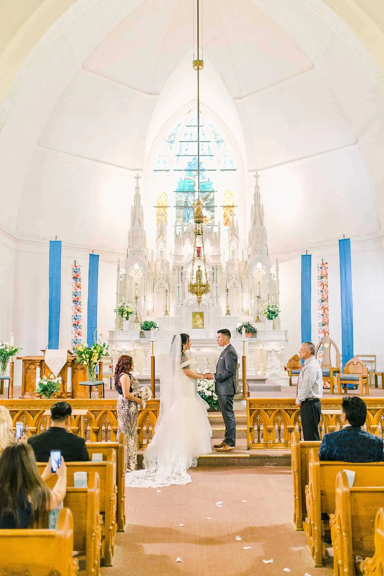 Cache Valley Logan Traditional Catholic Wedding Ceremony in a cathedral, Utah wedding photography