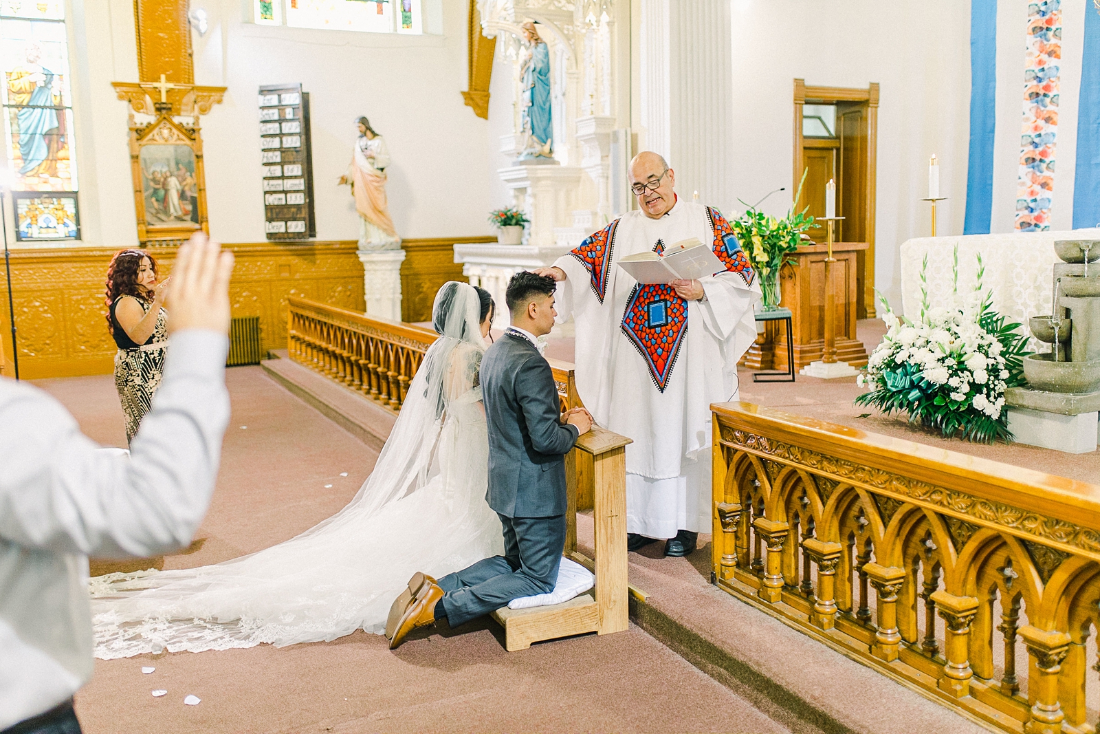 Cache Valley Logan Traditional Catholic Wedding Ceremony in a cathedral, Utah wedding photography