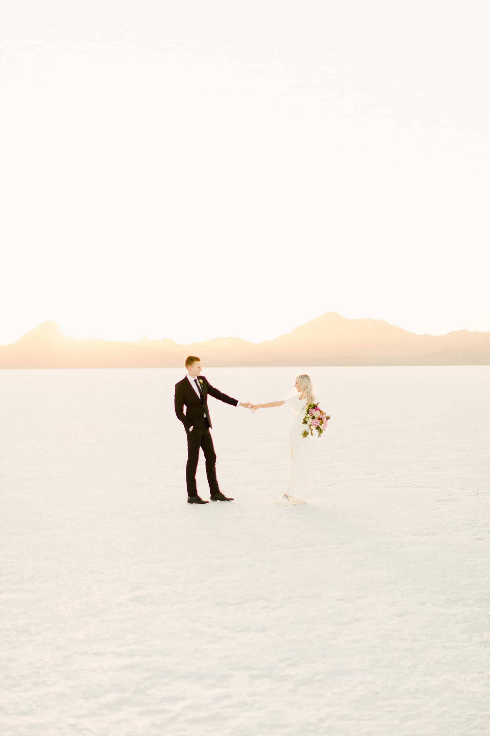 Bonneville Salt Flats Utah Wedding Photography, destination wedding, bride and groom golden sunset light