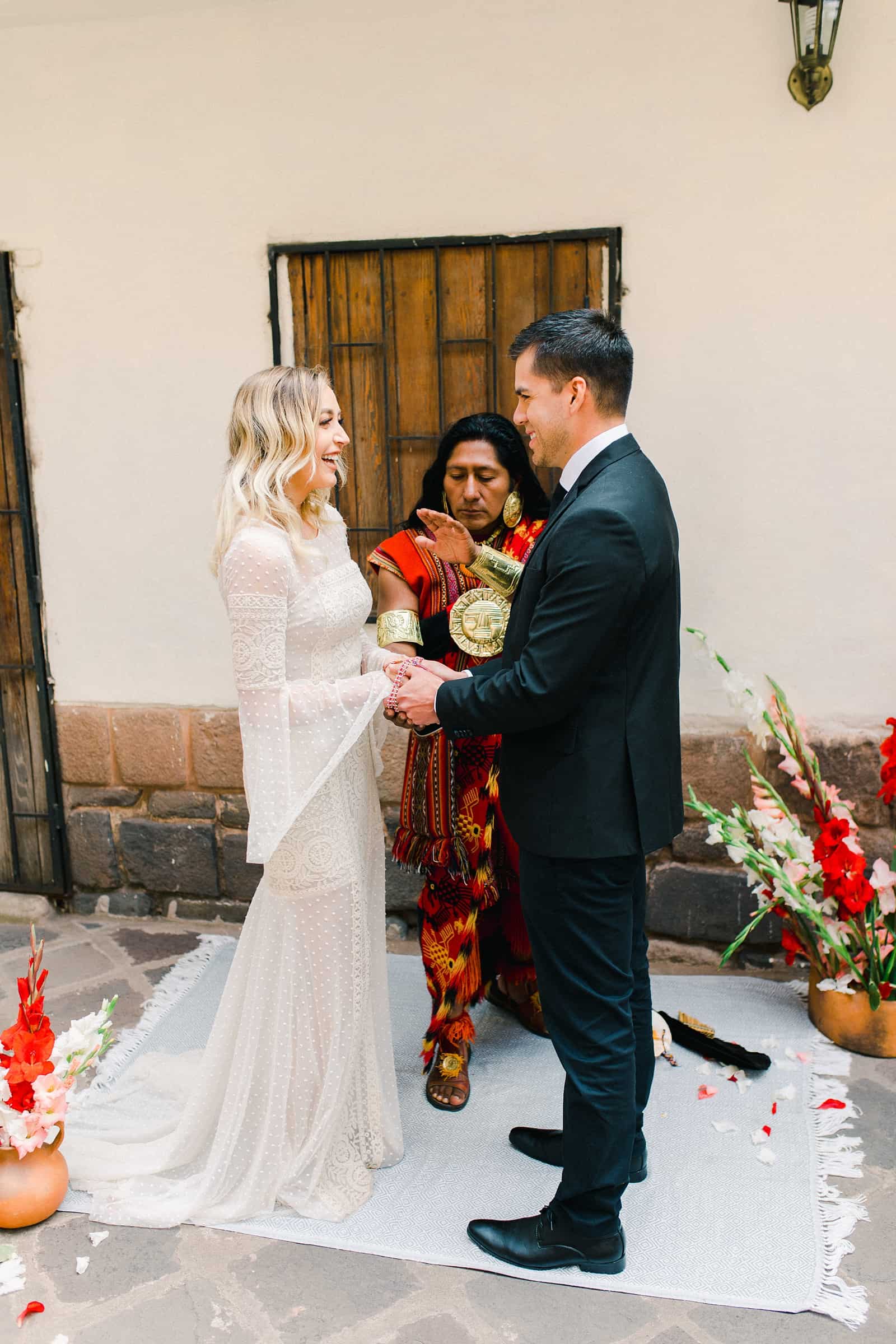 Cusco Peru Destination Wedding, travel wedding photography, Plaza de Armas ceremony with shaman boho wedding