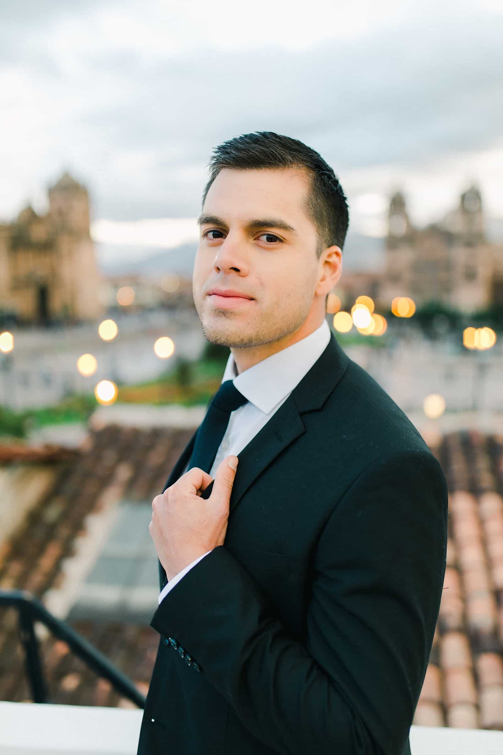 Cusco Peru Destination Wedding Inspiration, travel photography, groom in classic black suit tux with black tie