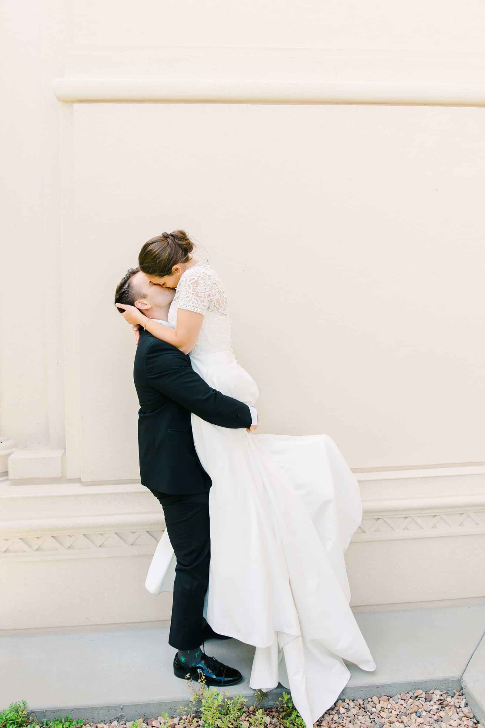 Payson Utah Temple wedding, bride and groom kiss