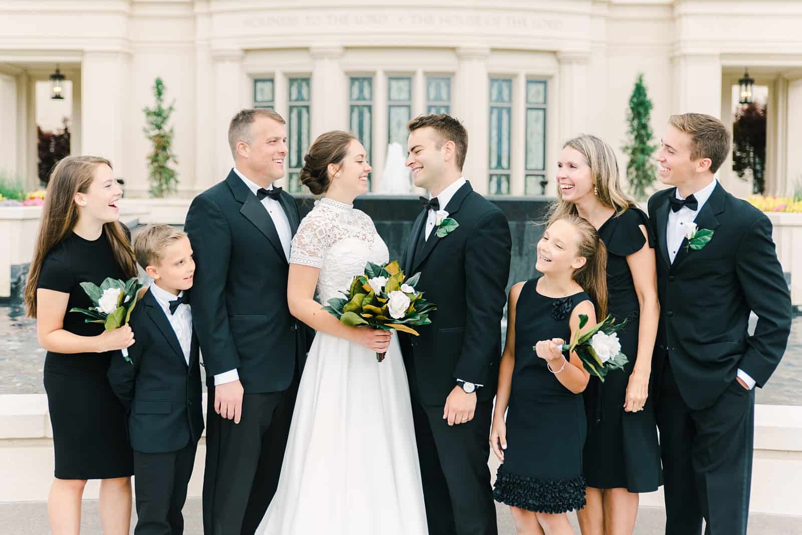 Payson Utah Temple wedding, family pictures in classic black dresses and tuxedos