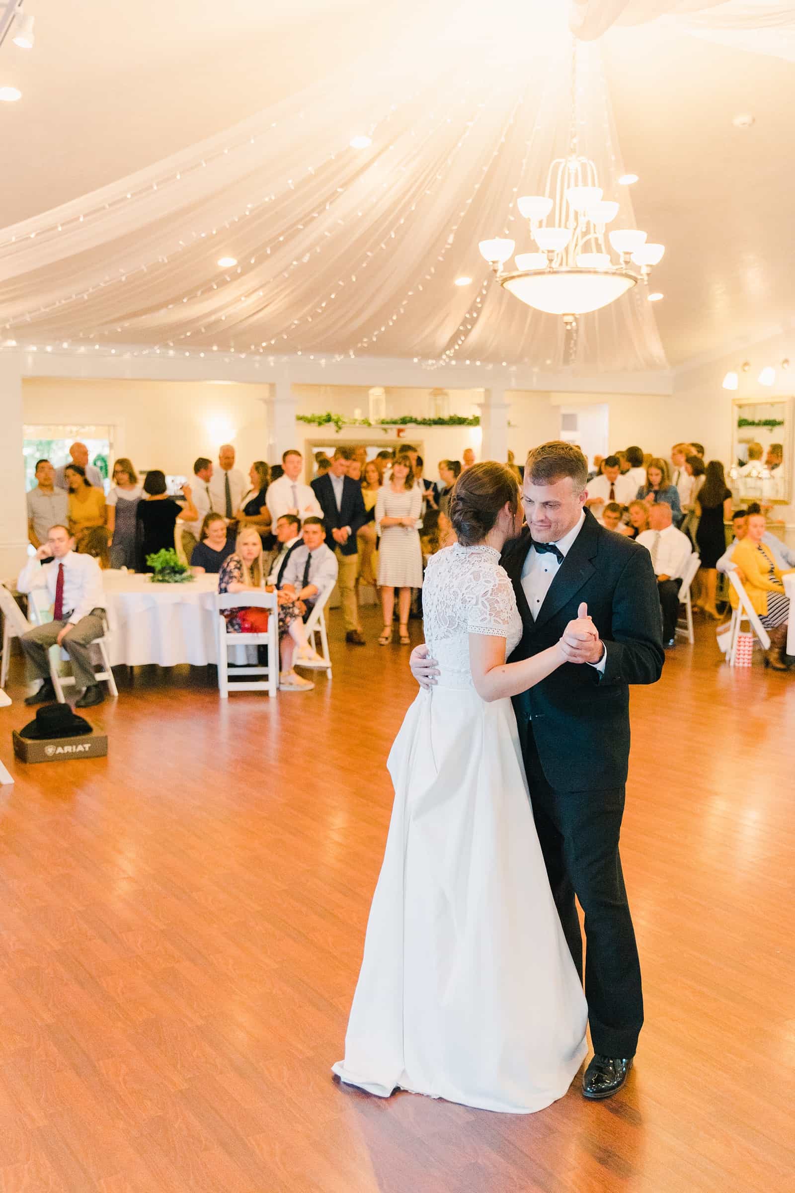 Clarion Gardens Payson Utah Wedding, bride dances with father of the bride