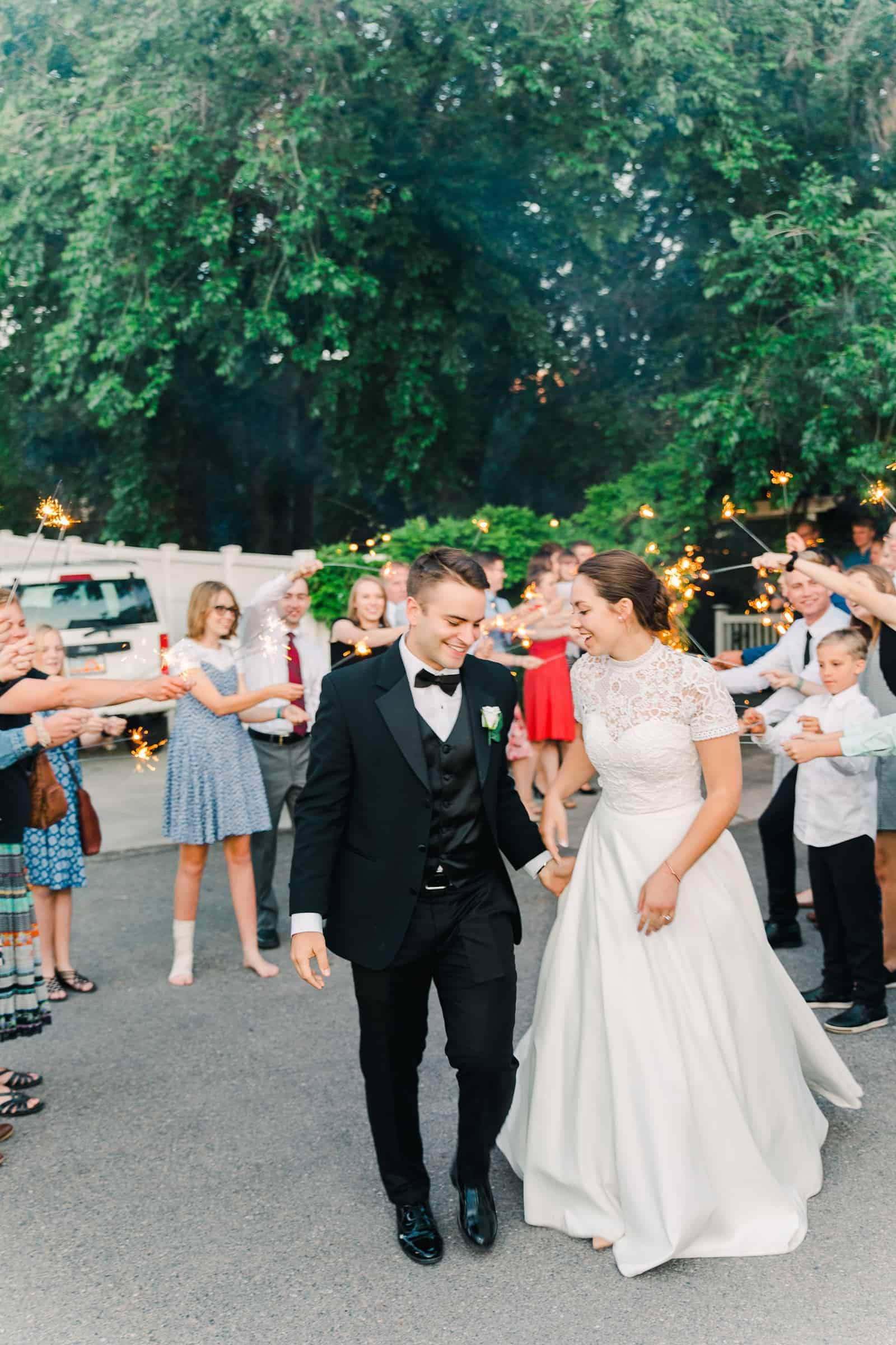 Clarion Gardens Payson Utah Wedding, bride and groom sparkler send off exit