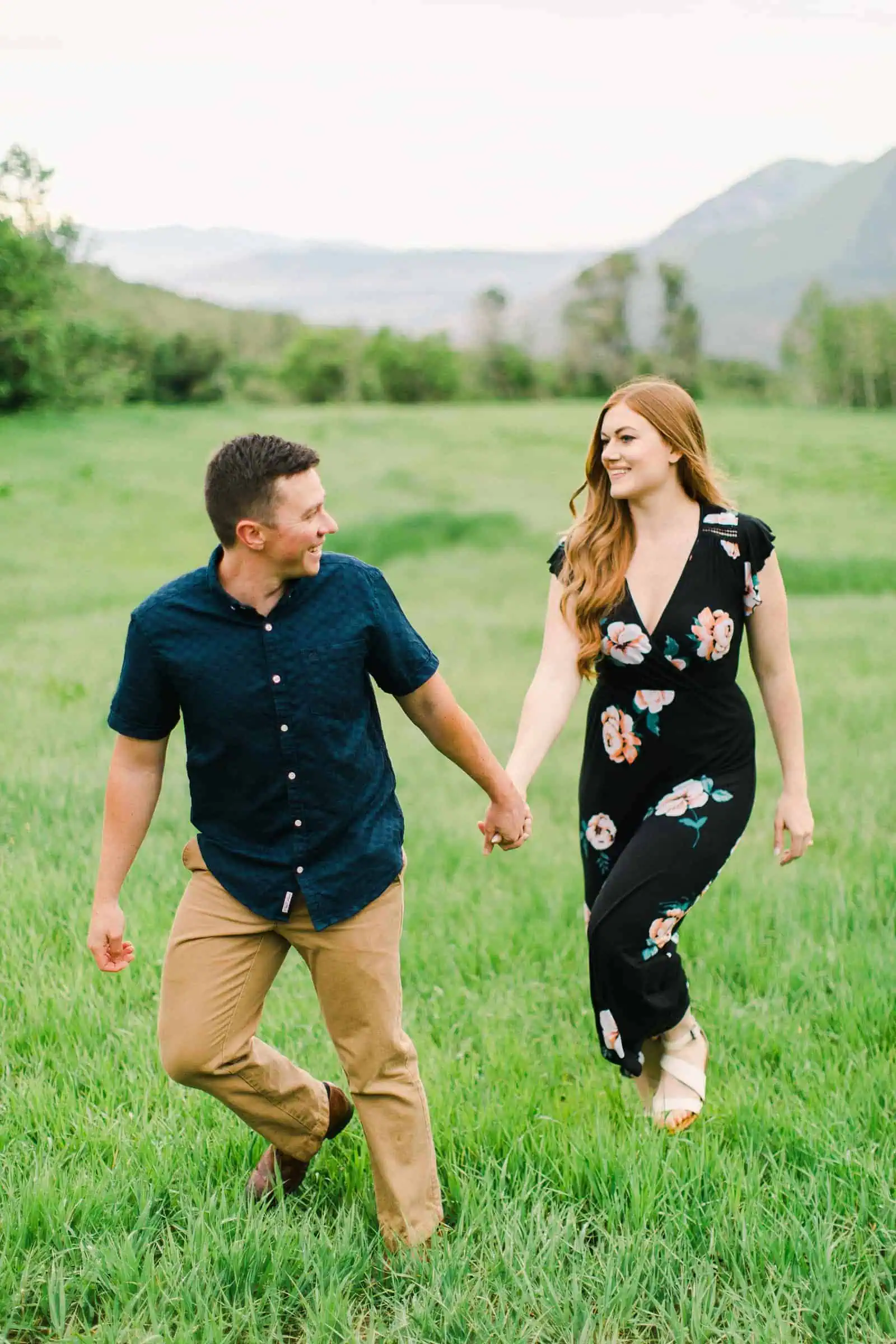 Provo Canyon wildflowers field engagement session, Utah wedding photography, engaged couple walking through grass