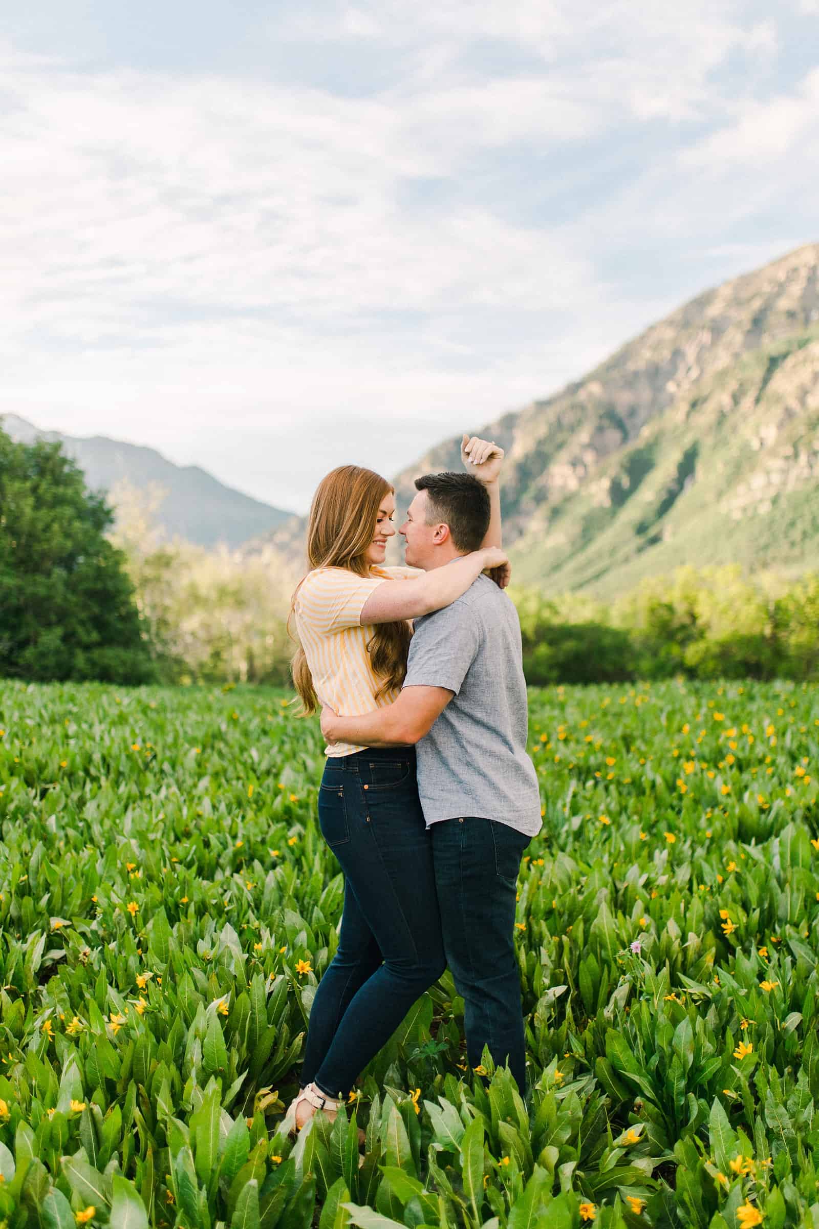 Provo Canyon wildflowers field engagement session, Utah wedding photography, engaged couple in yellow flowers and mountains