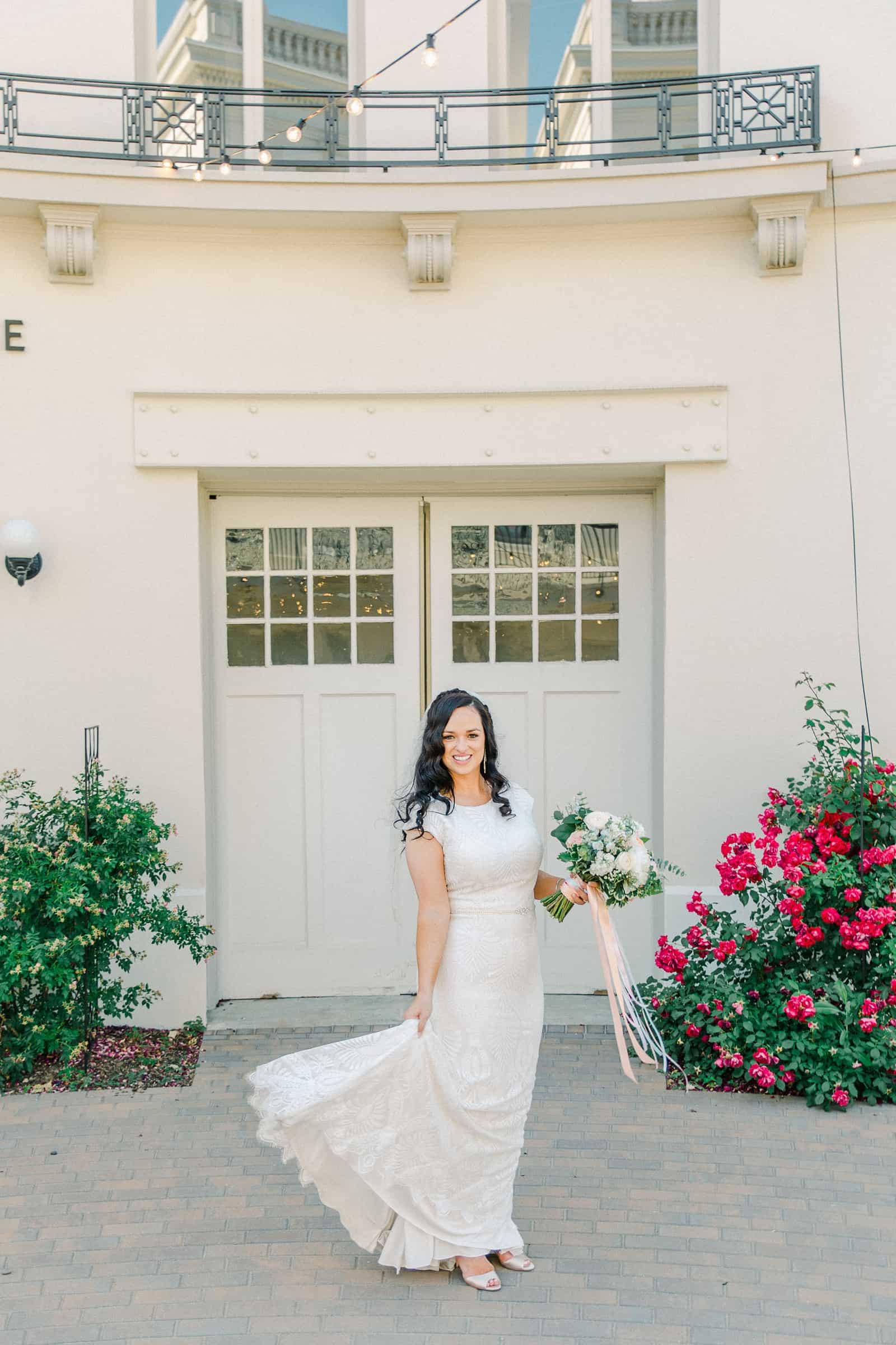 Thomas S. Monson Center Wedding, Salt Lake LDS Temple Wedding, Utah wedding photography. bride in modest lace wedding dress with veil, pink and white flowers wedding bouquet