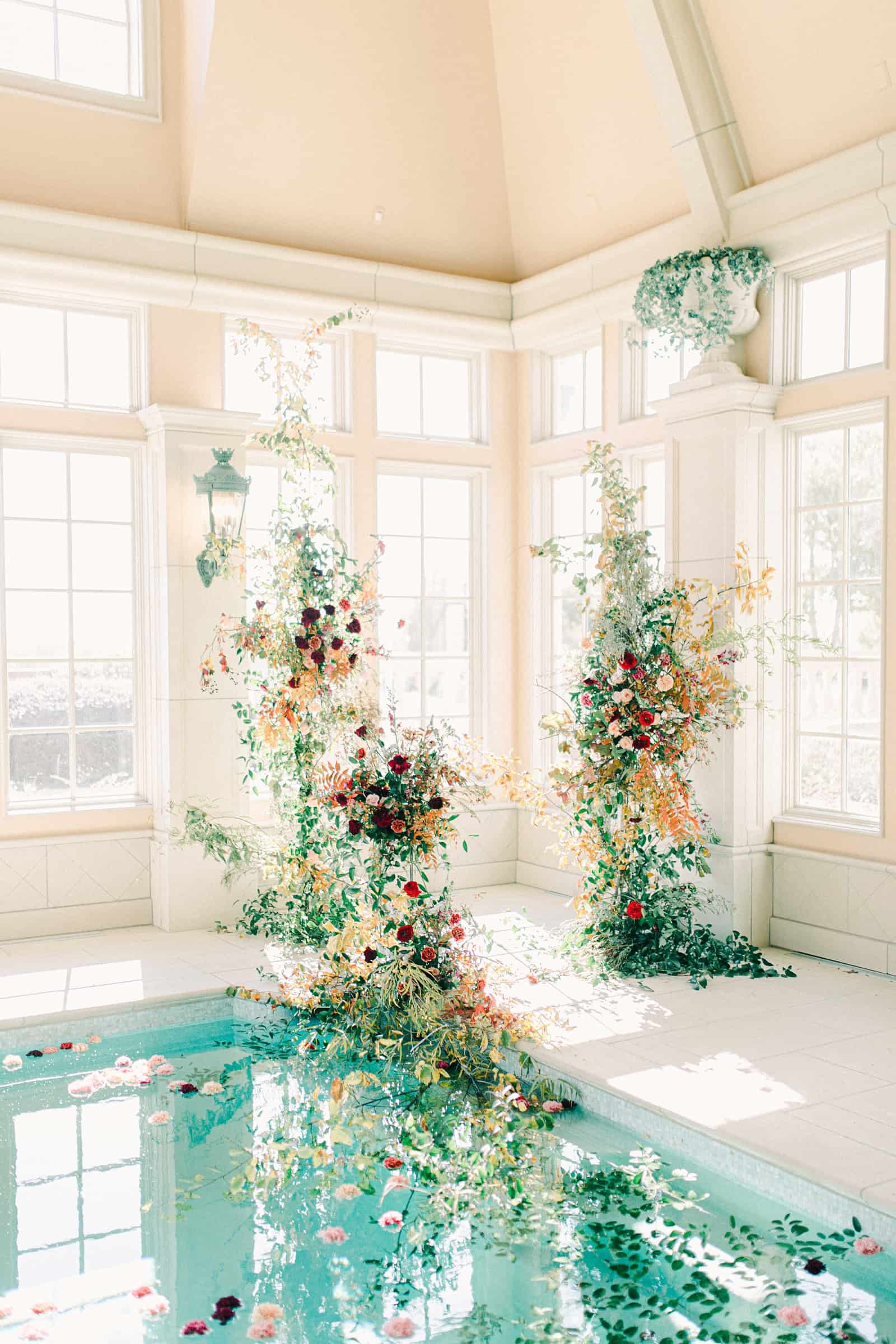 Ornate floral backdrop for elegant European wedding ceremony at the Olana in Dallas, Texas