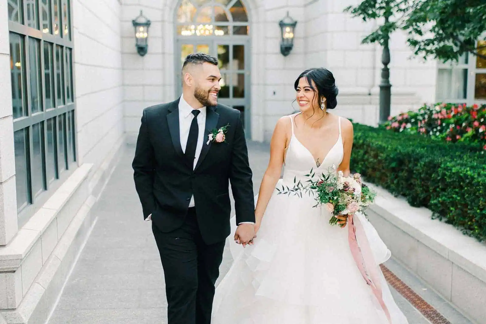 Bride and groom laughing at the Grand America Hotel wedding