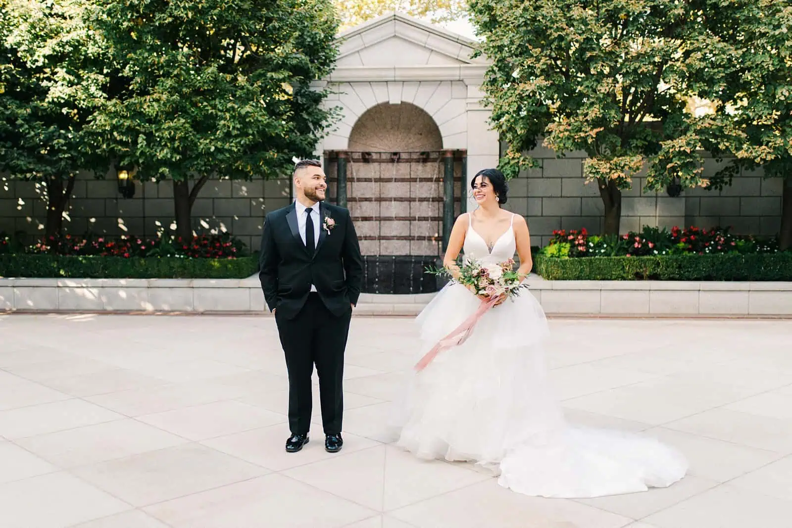 Bride and groom on their wedding day at the Grand America Hotel