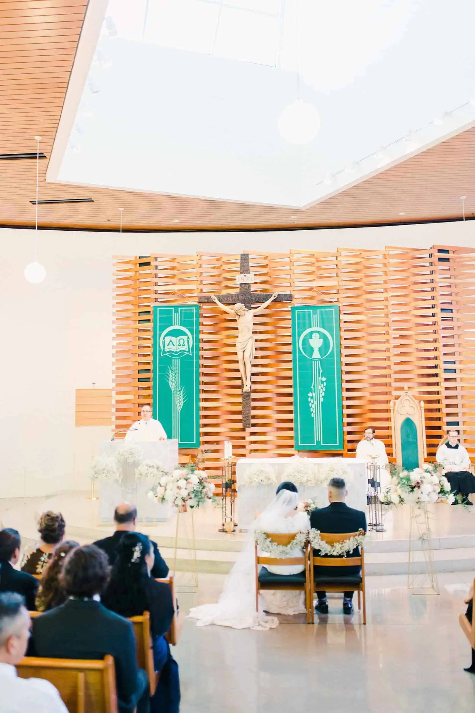 Chapel cathedral ceremony in Utah, bride and groom sitting