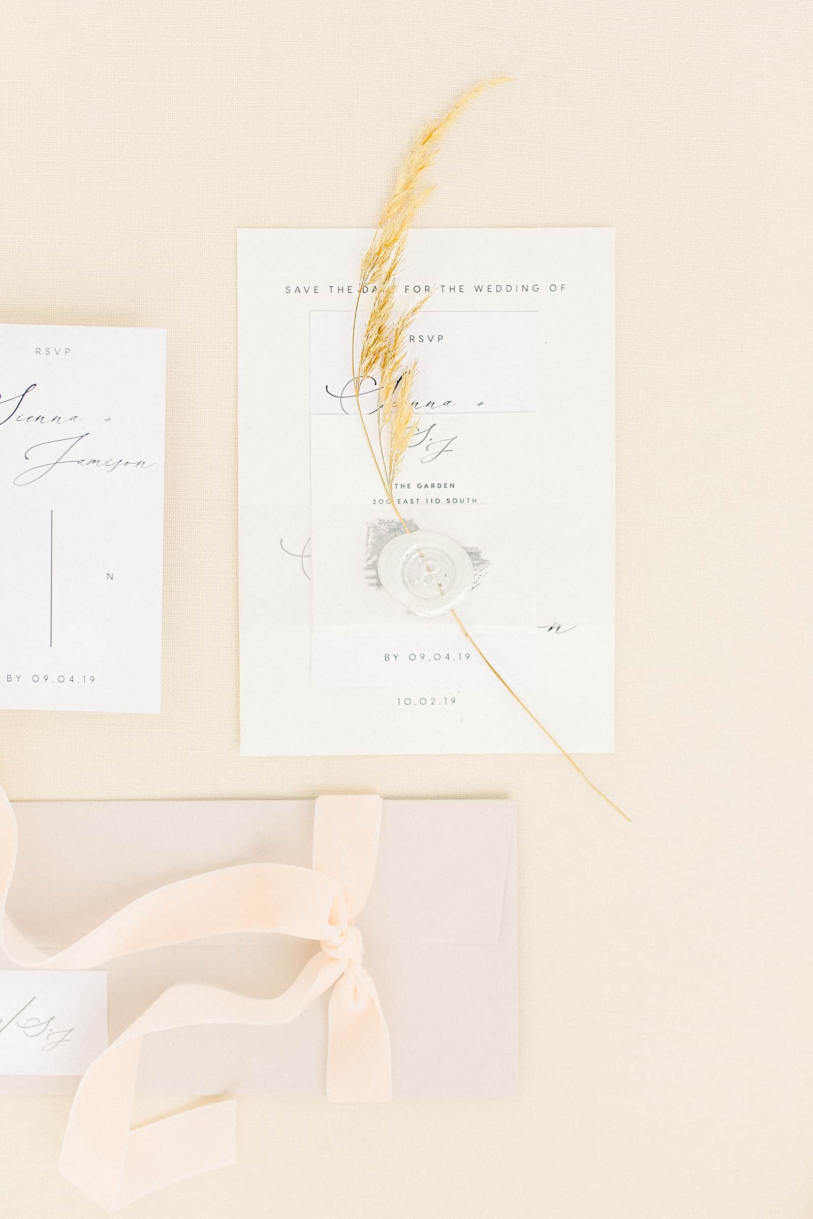 Modern minimalist wedding invitations with white wax seal