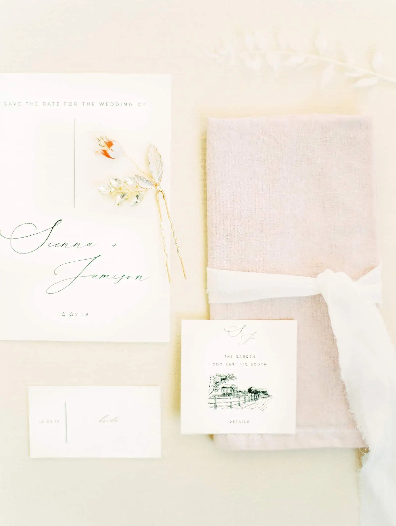 Modern minimalist wedding invitations with calligraphy and venue sketch