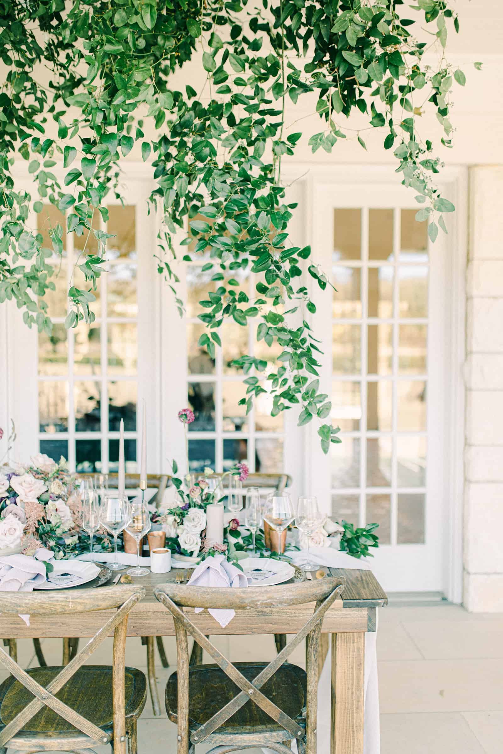 Garden wedding tables cape with greenery canopy