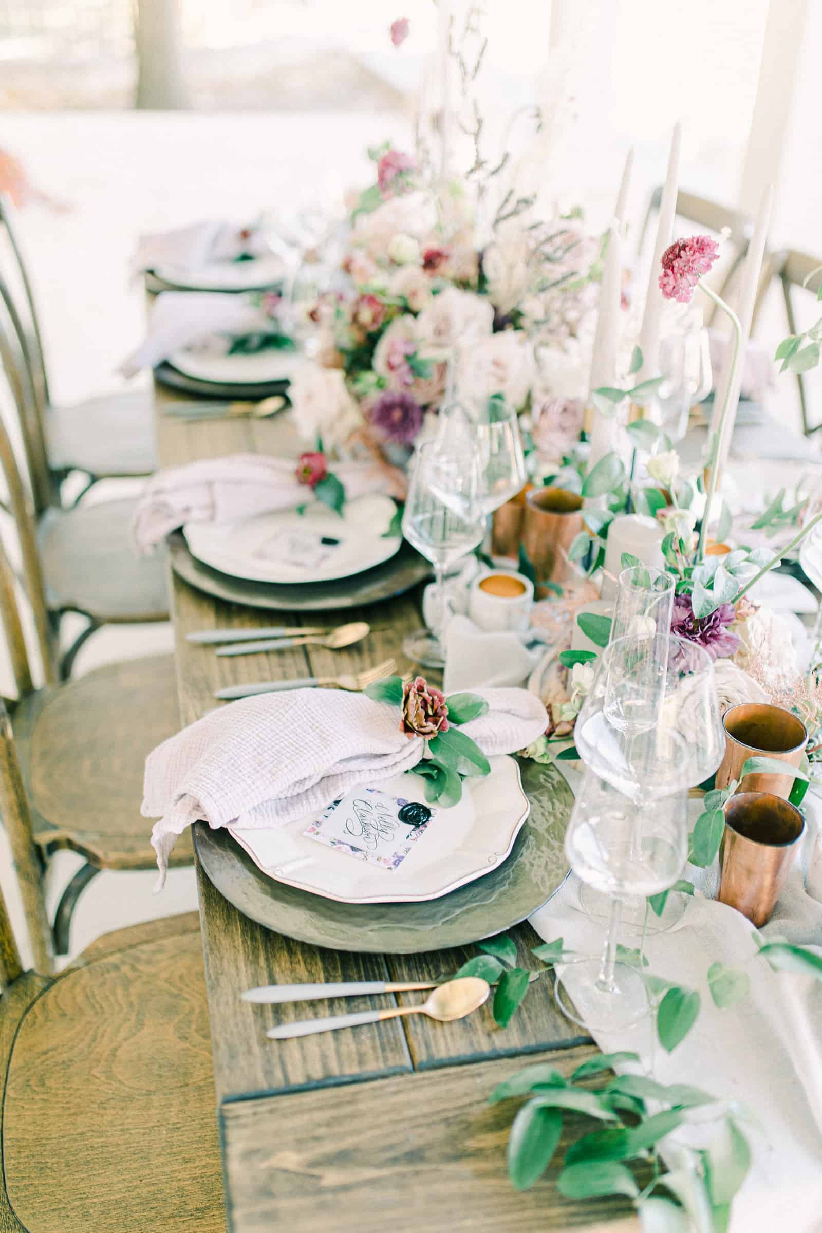 nature inspired wedding table for bridal party with flower napkin rings