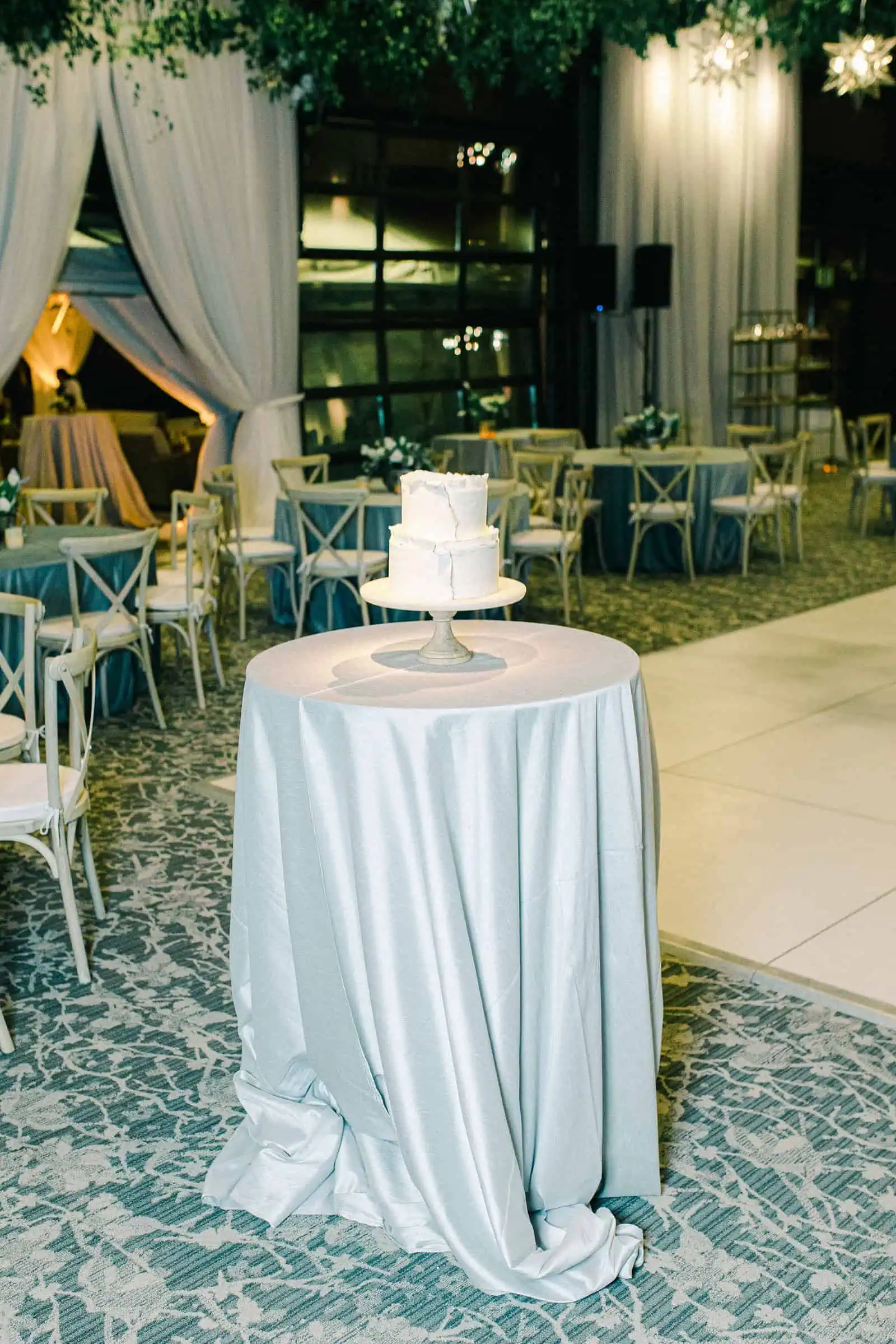 White and gray two tier modern wedding cake, reception decor