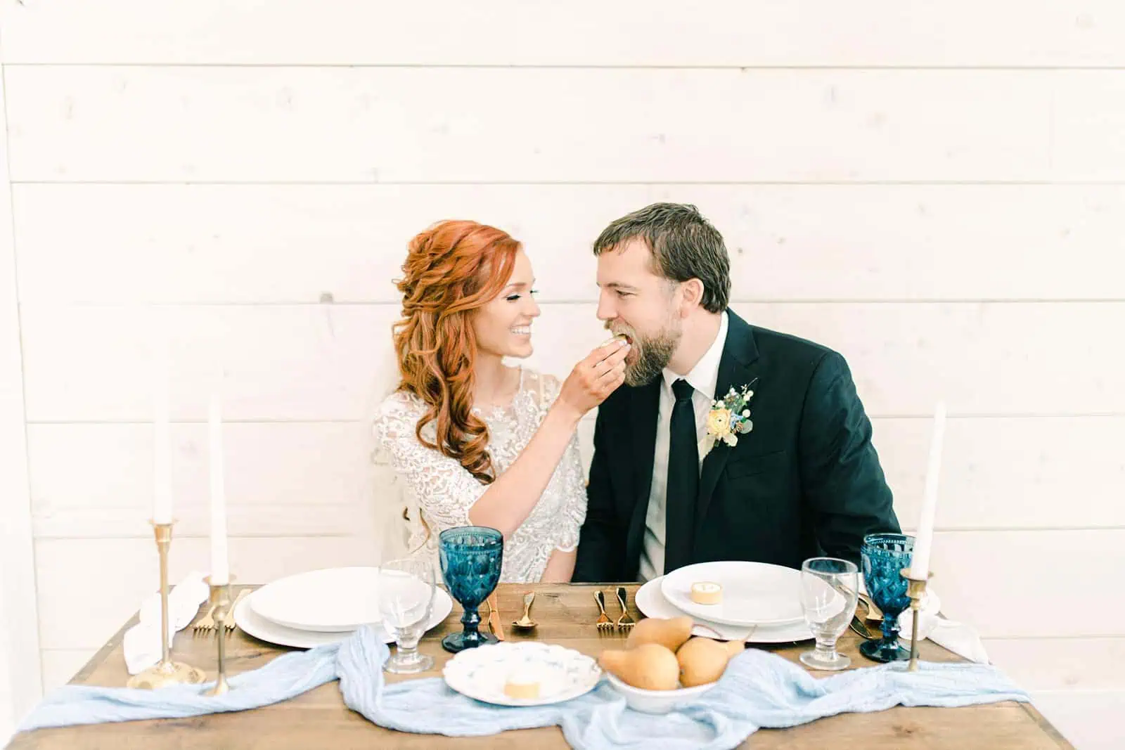 Bride feeds cake to groom, cake cutting, Utah bride and groom