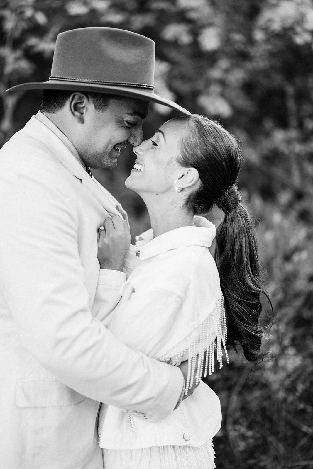 Romantic couple embracing outdoors, showcasing love and connection.