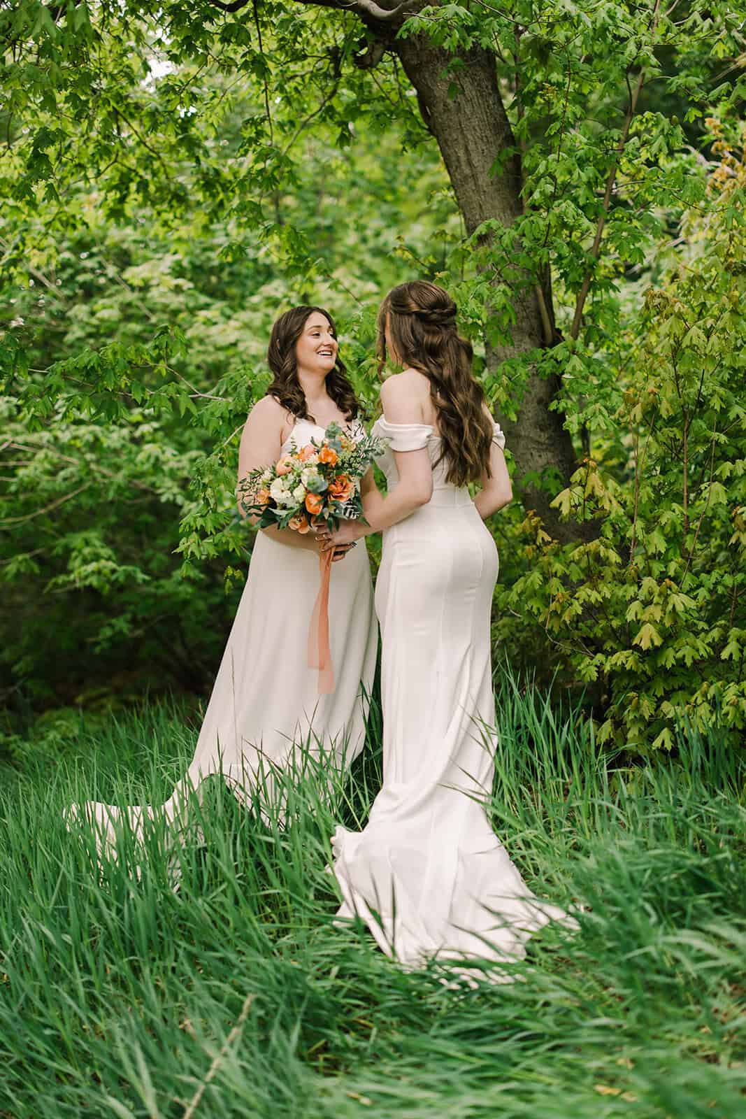 Branson Maxwell wedding photography capturing joyful moments between brides.