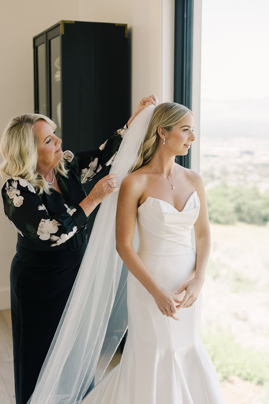 Branson Maxwell, bride preparing for her wedding, elegant bridal moment, professional wedding stylin.
