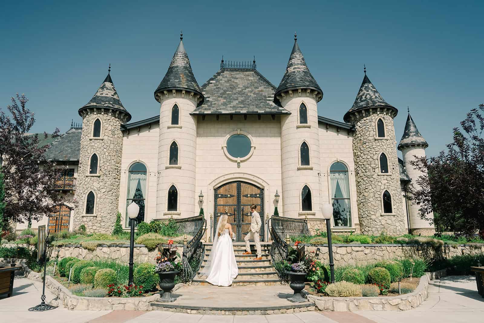 Castle wedding venue with elegant turrets and stone walls in Branson Maxwell.