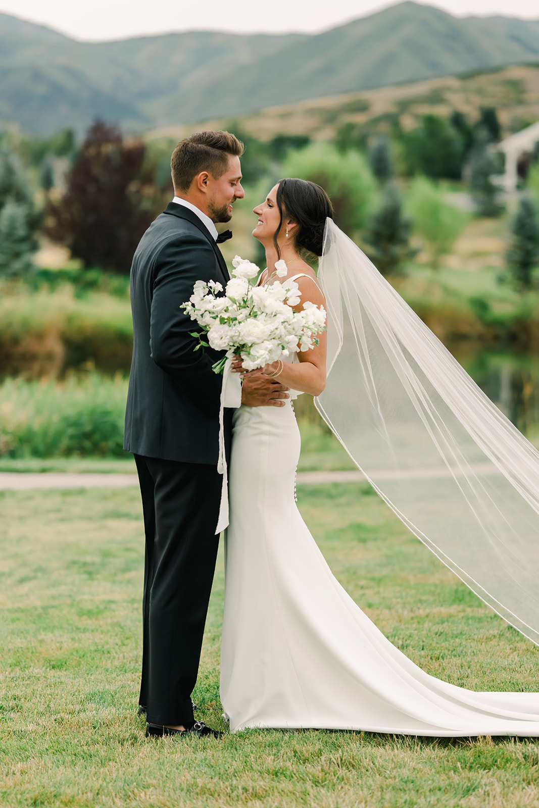 Couple Embrace After Wedding Ceremony at River Bottoms Ranch