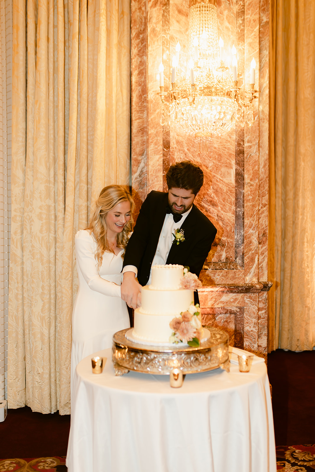 Bride and Groom Cutting Cake at Grand America Hotel Wedding