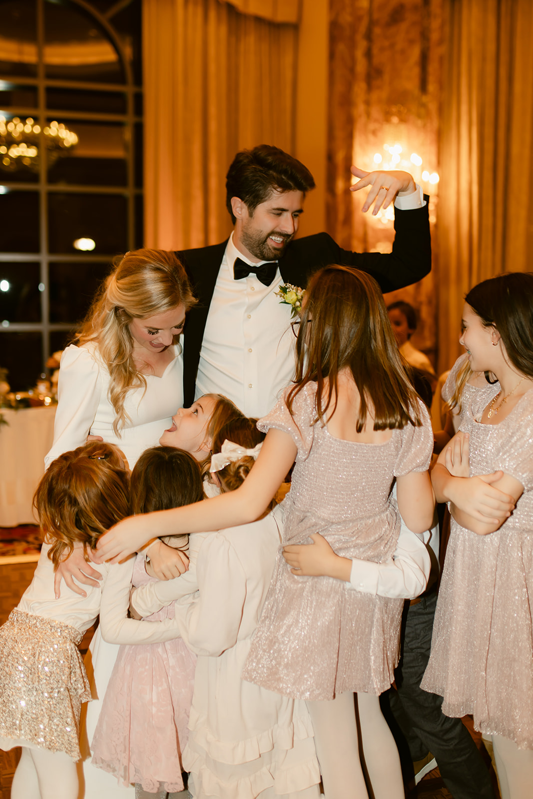 Bride and Groom on Dance Floor with Family at Grand America Hotel Wedding