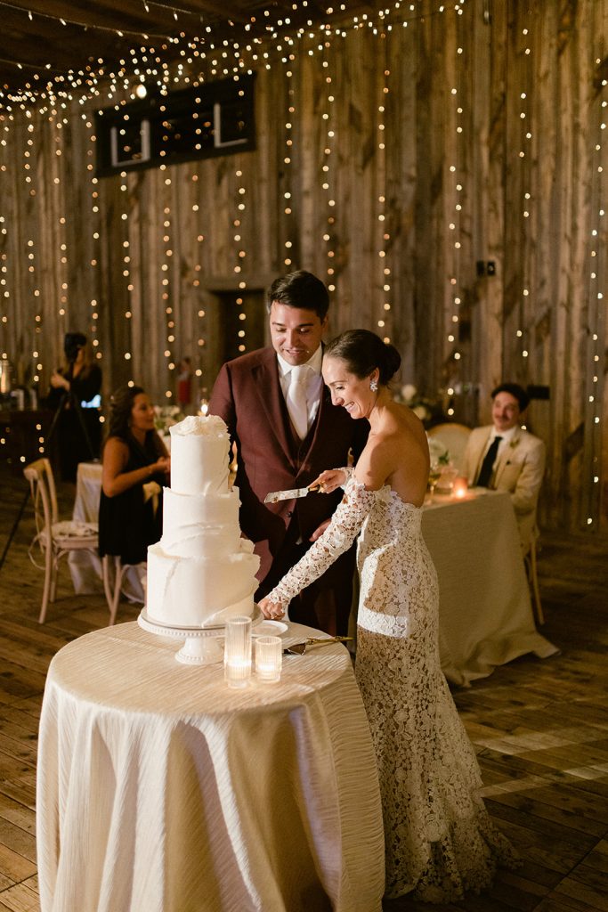 Bride and Groom Cut Cake at The Lodge at Blue Sky Utah Wedding